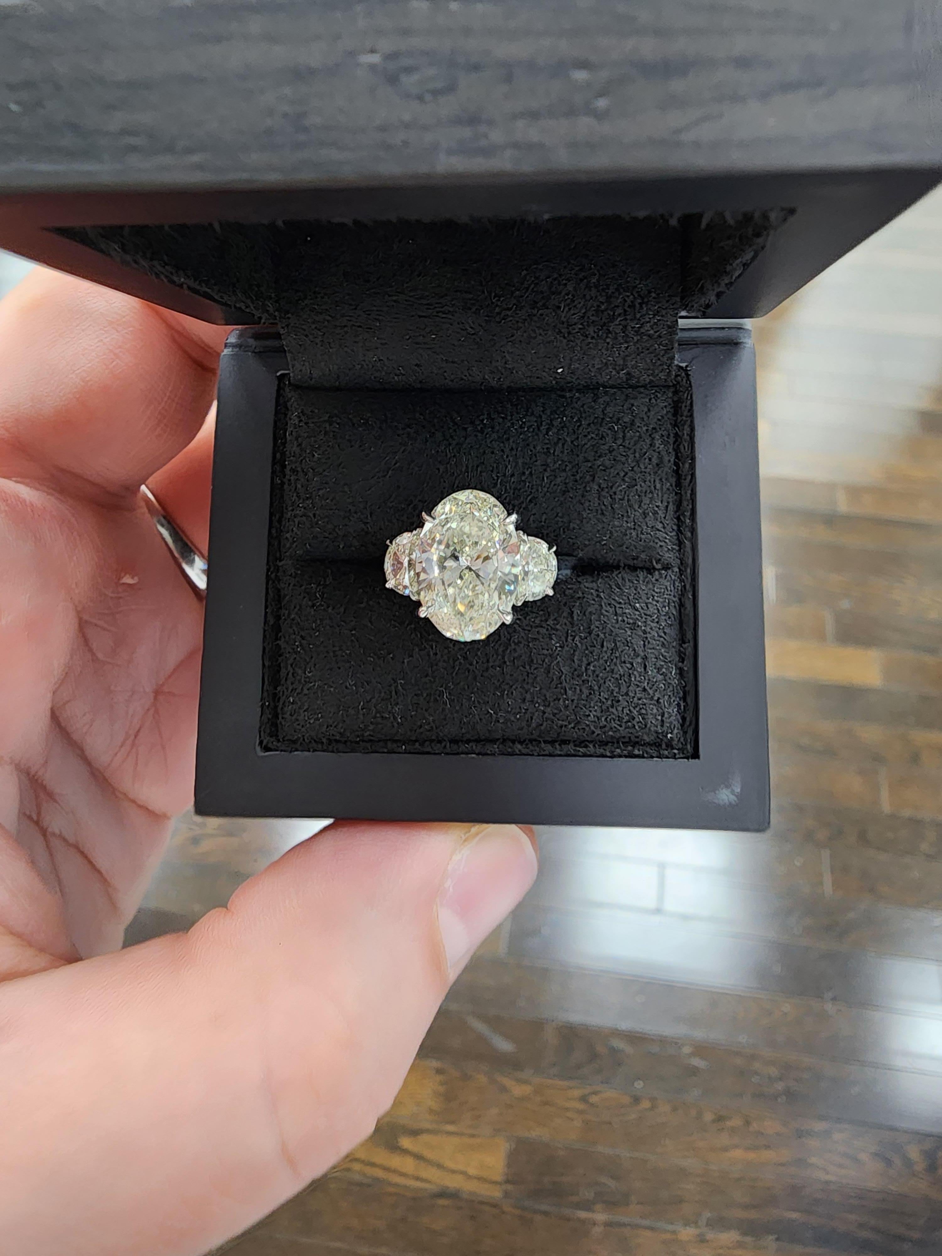 Oval Cut Louis Newman & Co 4.50 Carat Oval Diamond GIA Certified Three Stone Ring For Sale