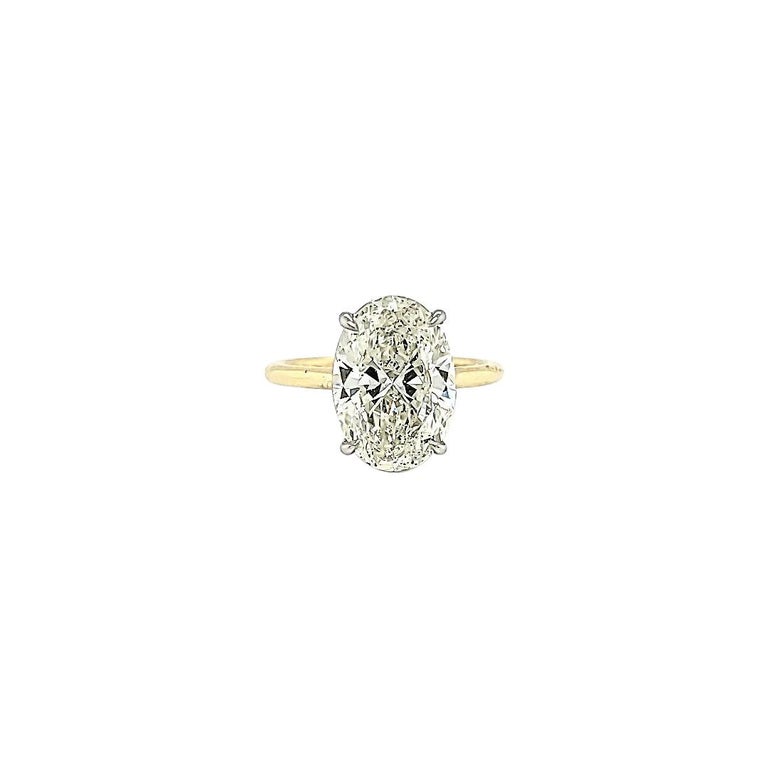 GIA Certified 4.50 Carat Oval Diamond Solitaire Ring For Sale