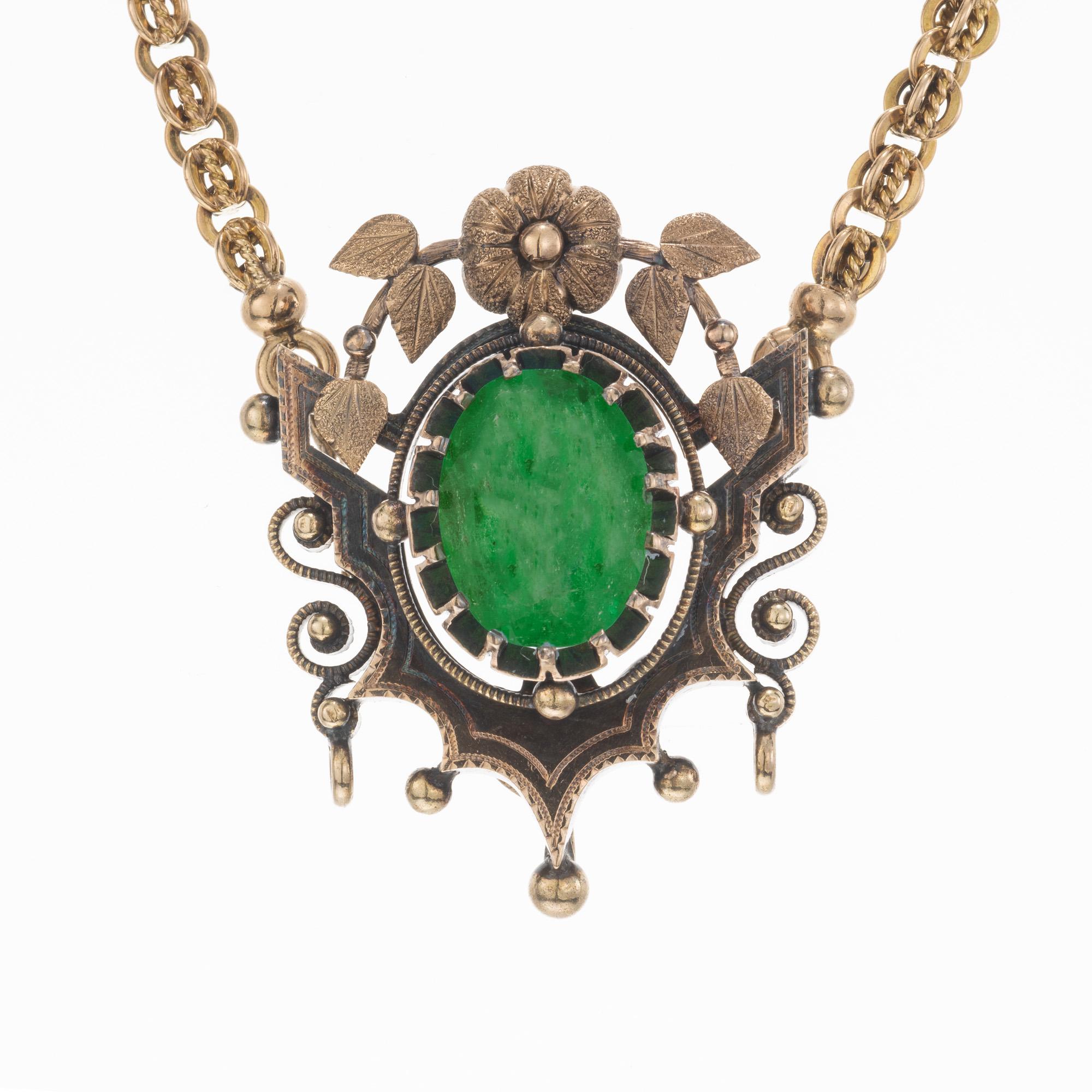 Handmade Victorian antique emerald pendant necklace circa 1860s. 4.50ct oval emerald center stone, set in a natural patina pendant setting. The 19.25 inch chain also has natural patina. There are hidden loops for a drop beneath the Emerald. The