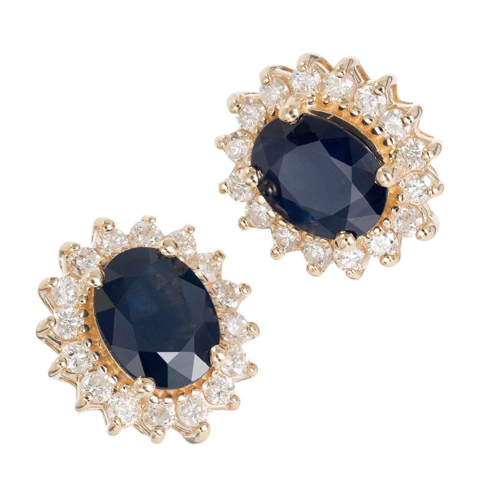 Classic 1960s deep blue oval Sapphire Diamond halo stud earrings in 14k yellow gold with bright sparkly full cut Diamonds. GIA certified natural Sapphire simple heat only.

14k yellow gold
2 oval blue Sapphires, approx. total weight 4.50cts, simple