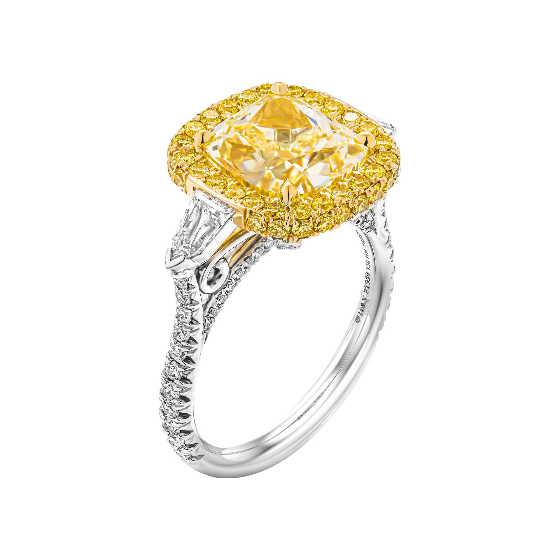 GIA Certified 4.50ct Fancy Light Yellow VVS1 Cushion Cut Three-Stone Ring In New Condition For Sale In New York, NY