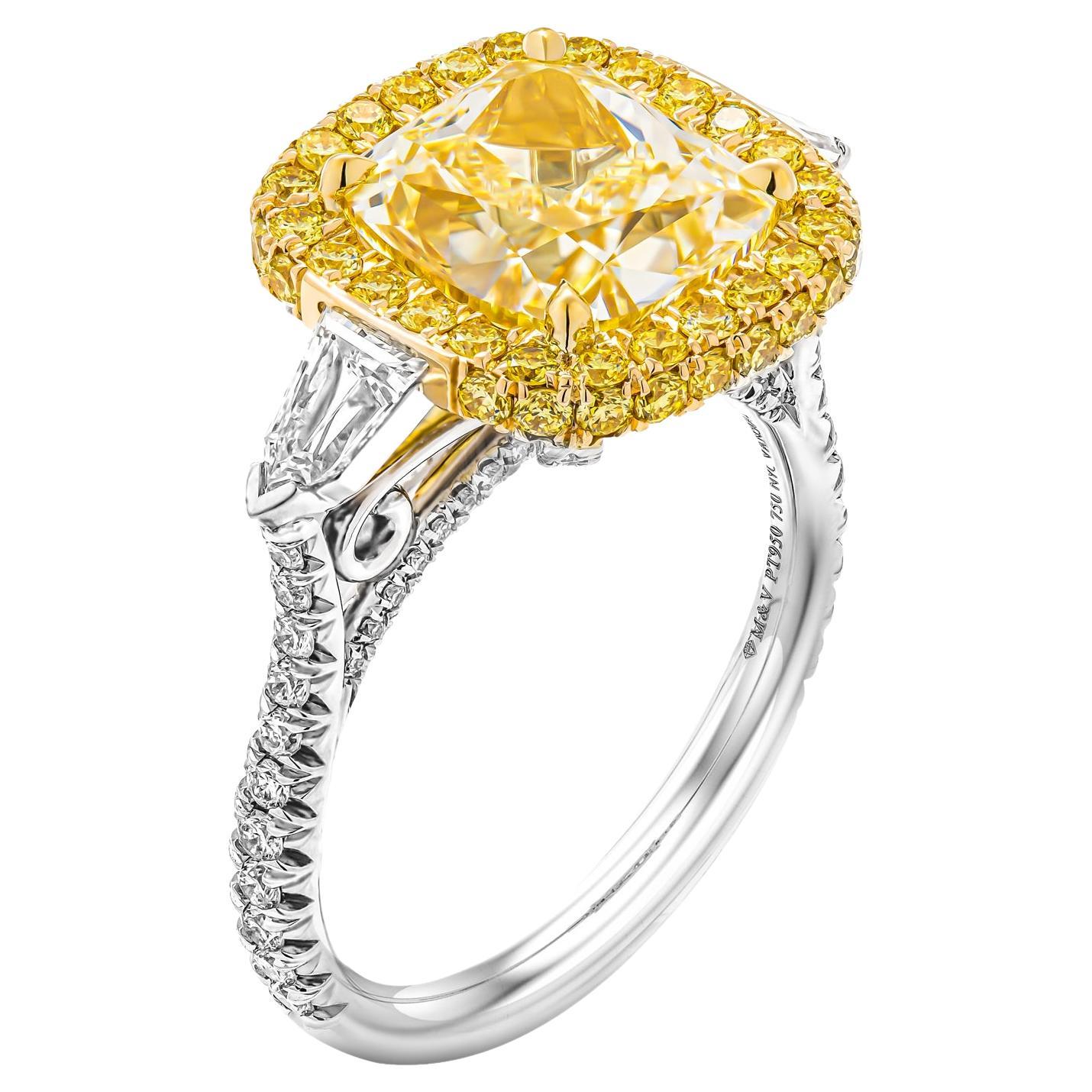 GIA Certified 4.50ct Fancy Light Yellow VVS1 Cushion Cut Three-Stone Ring For Sale
