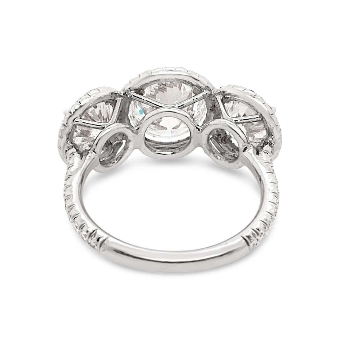 Women's GIA Certified 4.51 Carat 'total weight' 3-Stone Diamond Halo Ring in Platinum