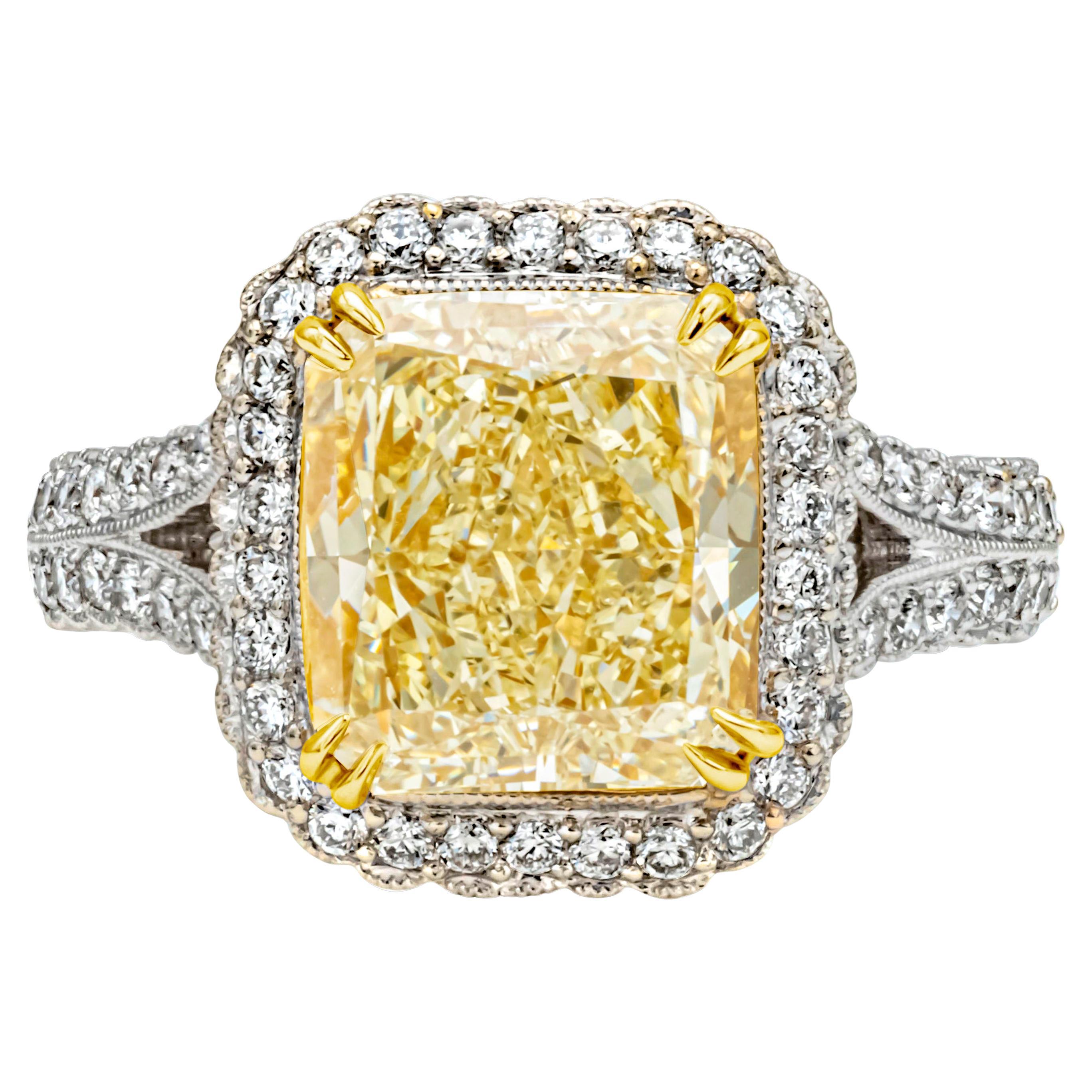 GIA Certified 4.51 Carats Radiant Cut Fancy Yellow Diamond Halo Engagement Ring  For Sale