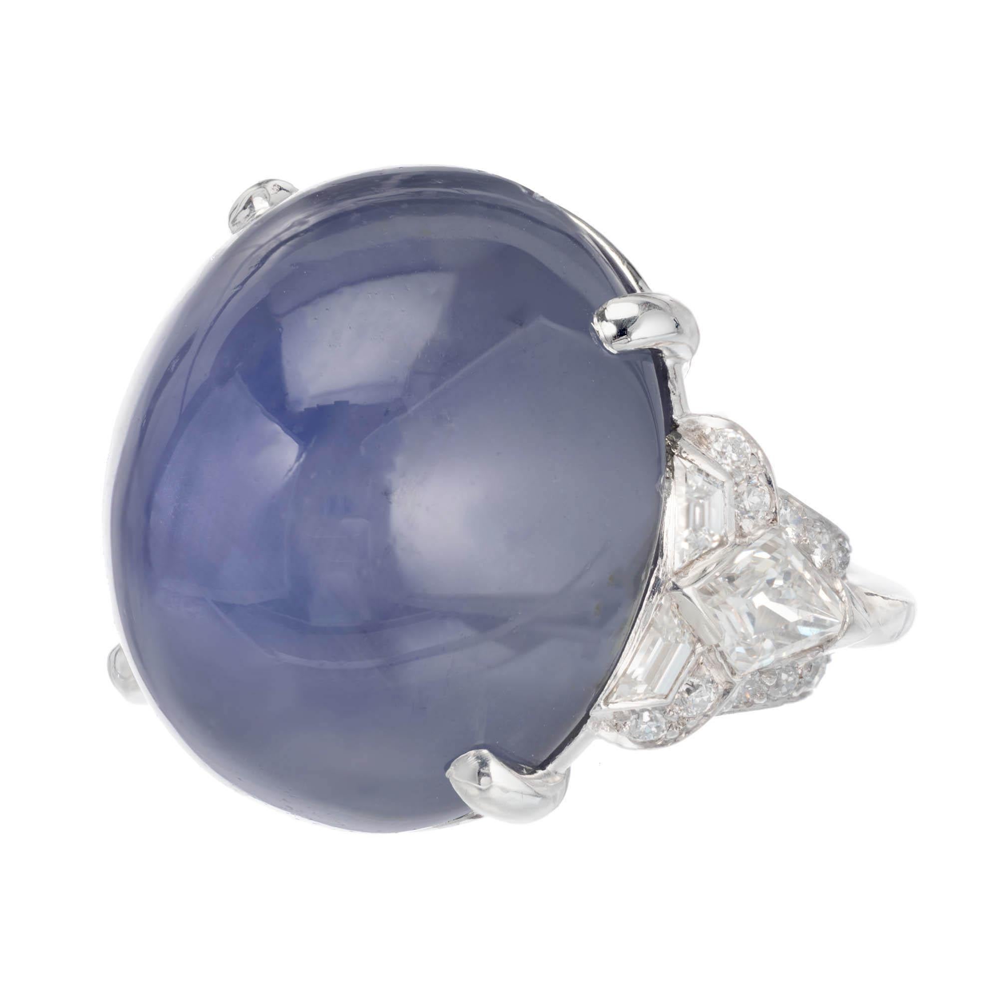 Vintage 1920's translucent 45.18 carat star sapphire Art Deco cocktail ring. Platinum setting accented with trapezoid, kite and round diamonds.  GIA certified no heat, no enhancements.

1 oval double cabochon blue star sapphire, Approximate 45.18