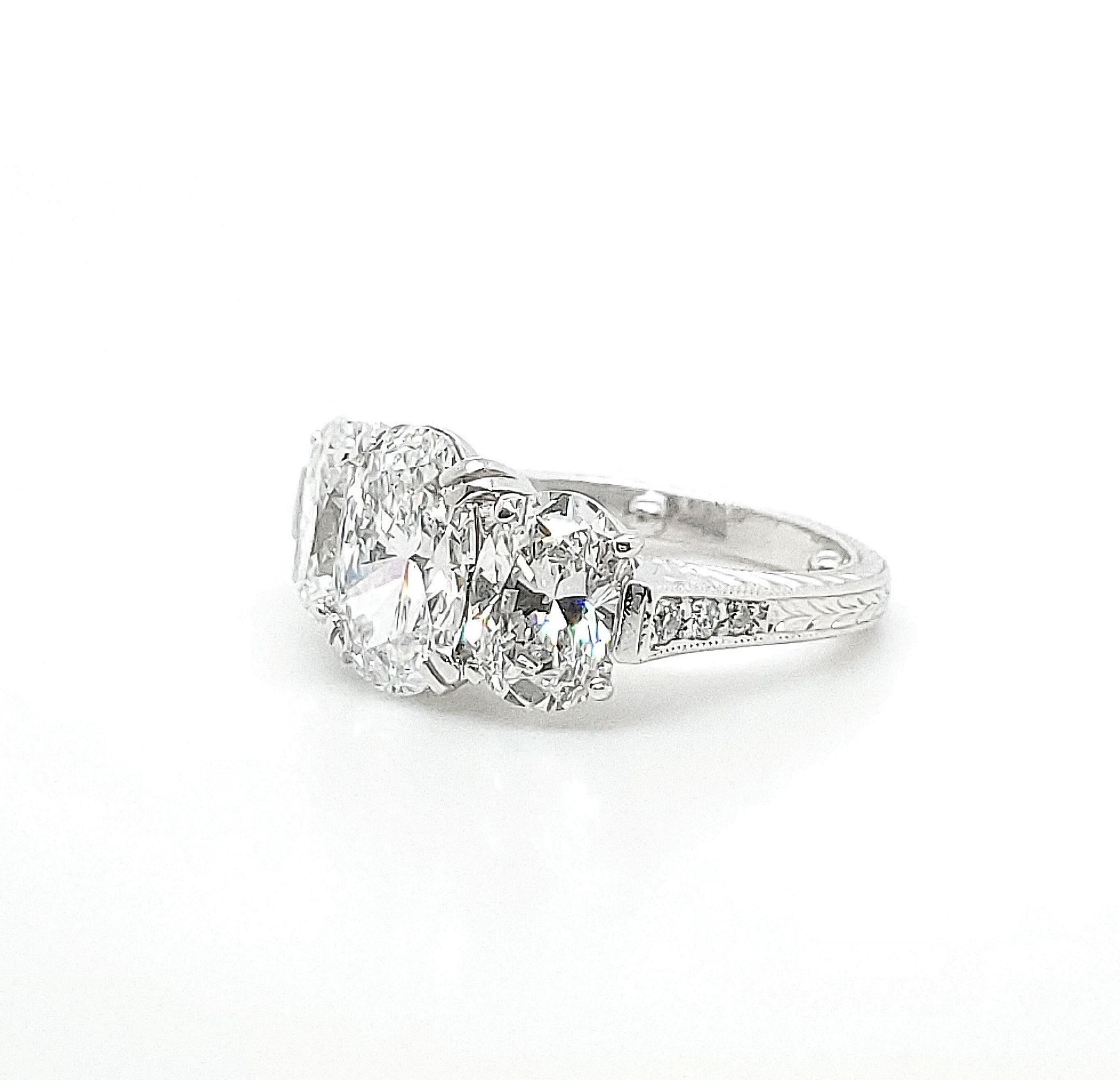 Oval Cut GIA Certified 4.53 Carat Platinum Diamond Three-Stone Ring