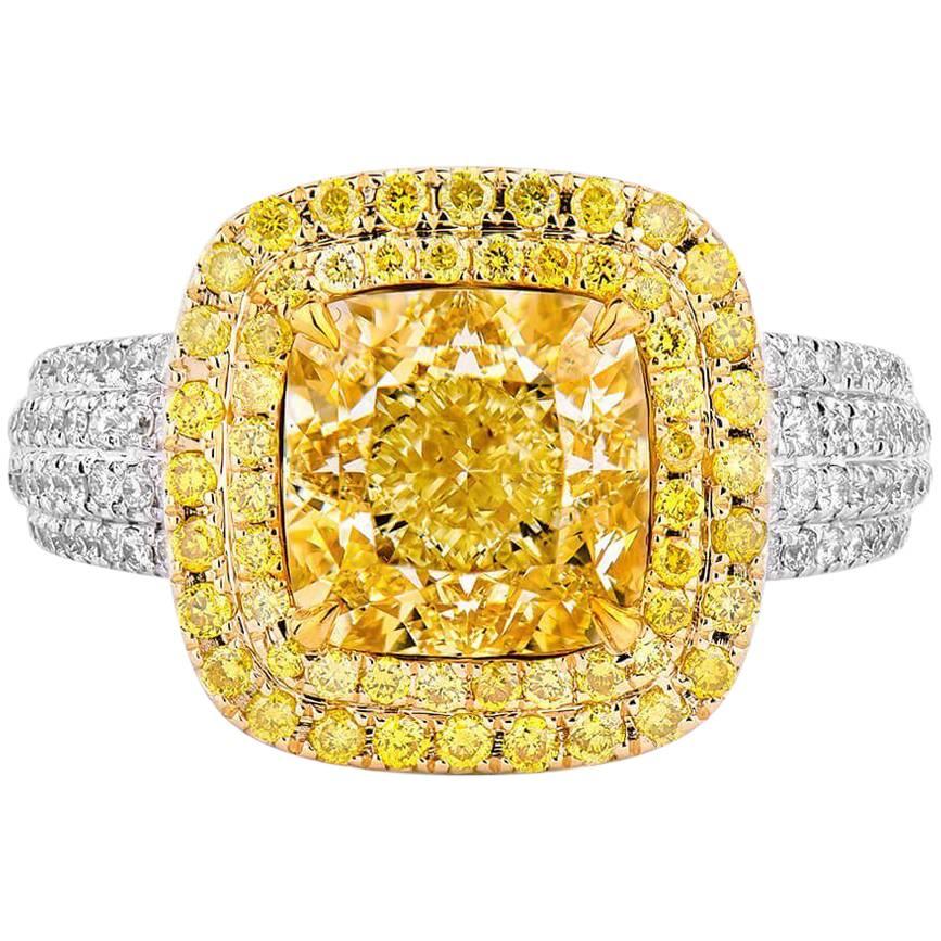 GIA Certified 4.55 Carat Fancy Yellow Ring For Sale