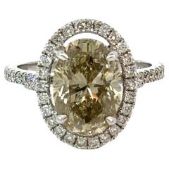 GIA Certified 4.56 Carat Brownish Greenish Yellow Oval Brilliant Diamond Ring