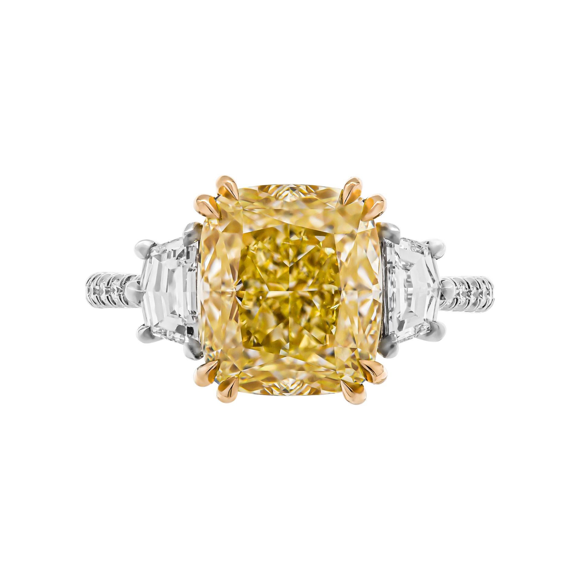 Mounted in handmade custom design setting featuring Platinum 950 & 18K Yellow Gold with pave on the shank

Setting features exceptional pave work, delicate yet sturdy, includes approximately 0.26ct  of small full brilliant cut diamonds. 
Side stones