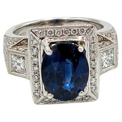 GIA Certified 4.57 Carat Natural Blue Sapphire Ring with Diamonds in 18k Gold