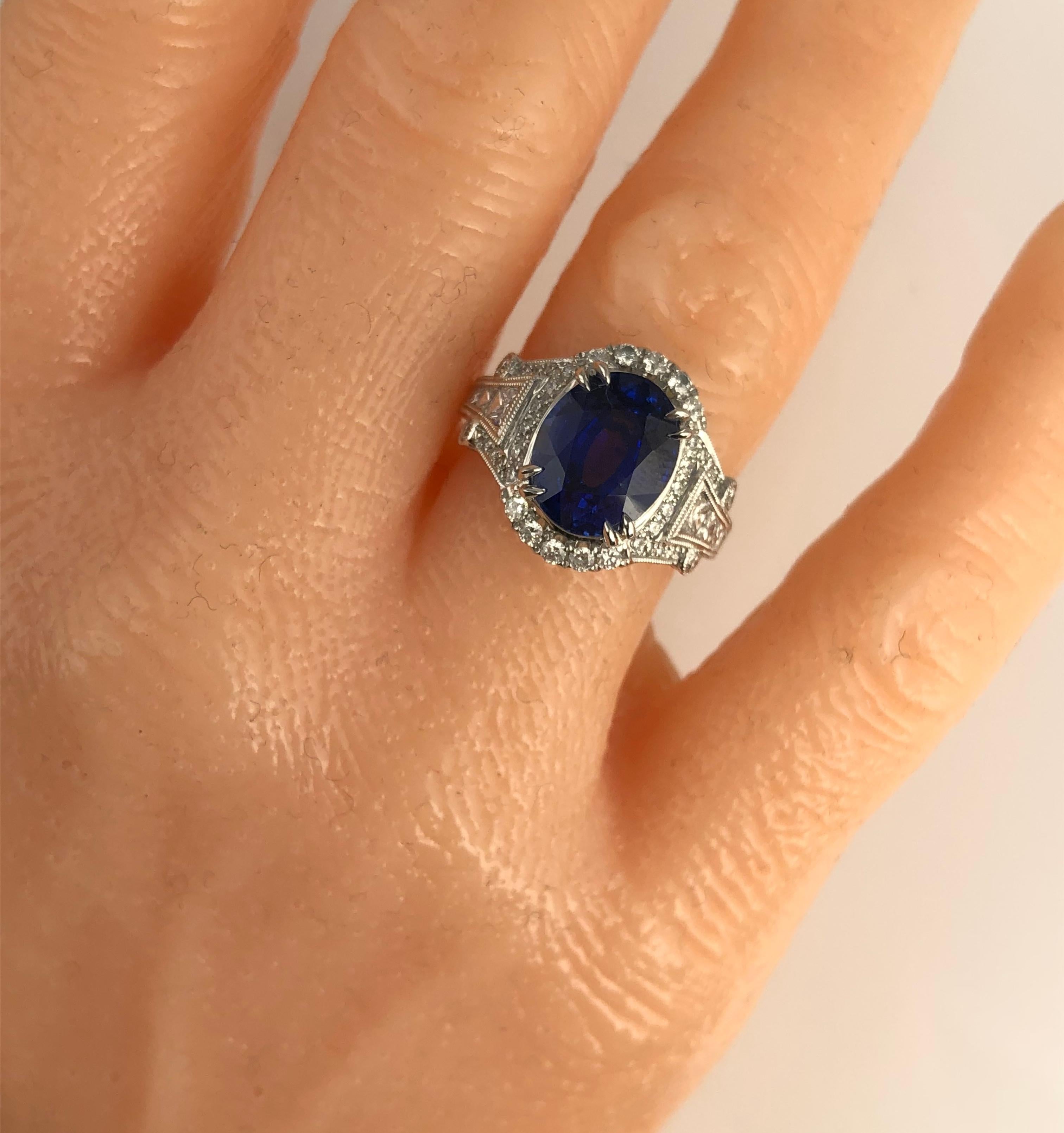 Contemporary GIA Certified 4.59 Carat Oval Cut Fine Ceylon Sapphire Ring in 18k White ref760 For Sale