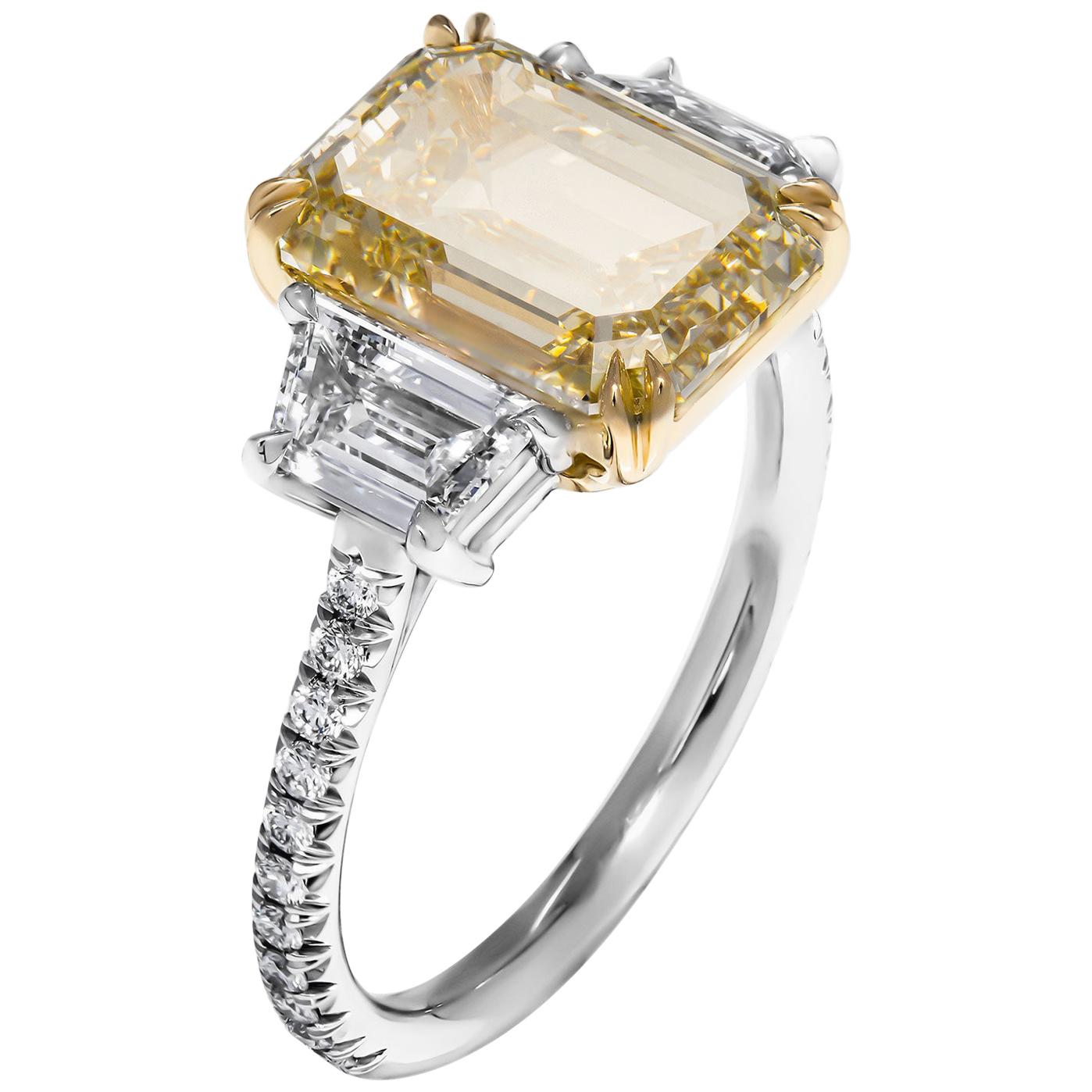 Mounted in handmade custom design setting featuring Platinum 950 & 18K Yellow Gold, diamonds on the shank and basket under each stone, a true piece of art

Setting features exceptional pave work, delicate yet sturdy, includes approximately 0.26ct