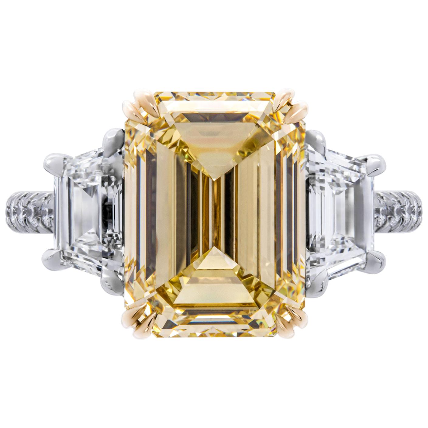 GIA Certified 4.61Carat Emerald Cut Fancy Light Brownish Yellow Three-Stone Ring