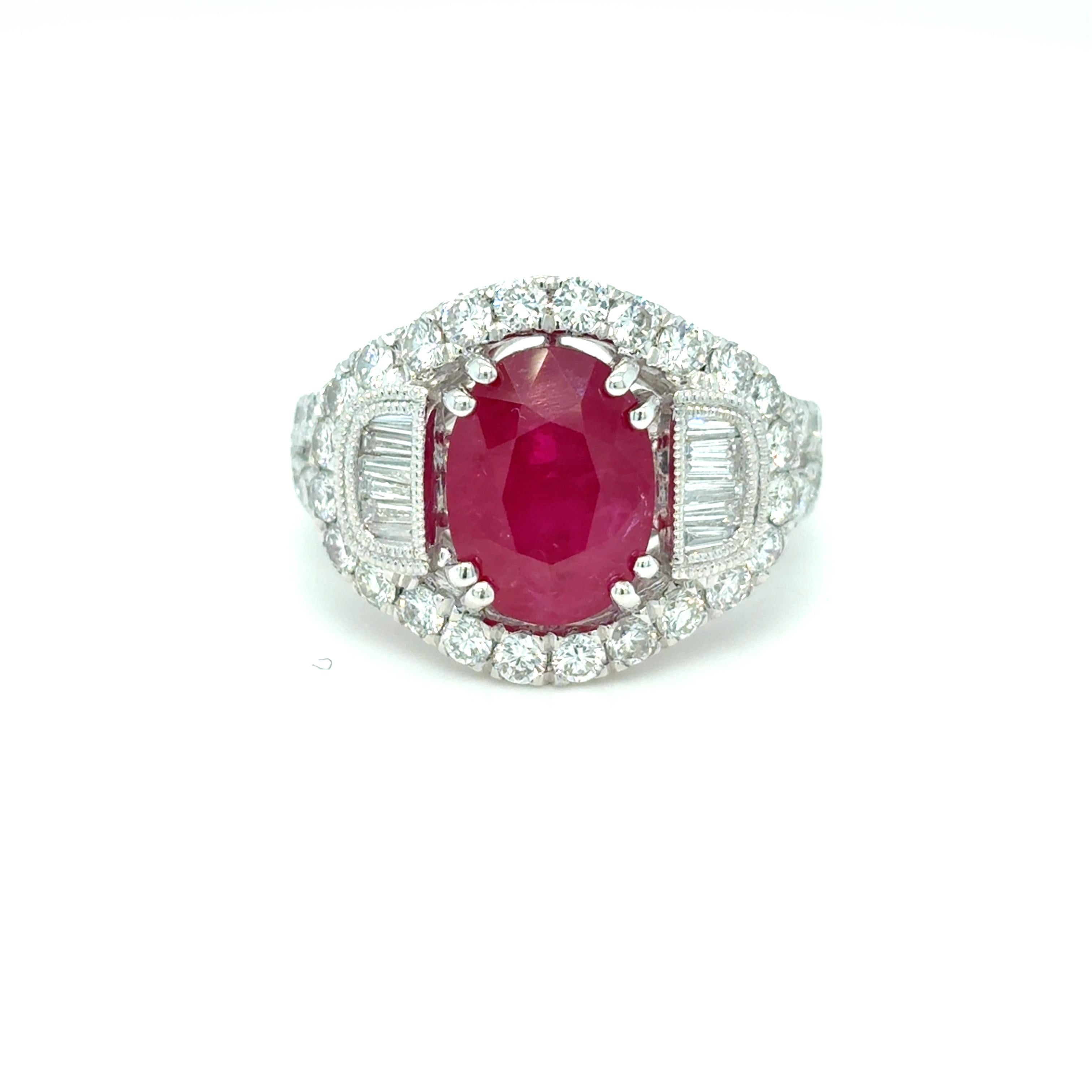 GIA-Certified 4.62 Carat Mozambique Ruby & Diamond Ring
This exquisite ring features a 4.62 carat oval-cut ruby of prized Mozambique origin, renowned for its exceptional color and rarity. The vibrant center stone is surrounded by a dazzling 1.55