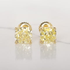GIA Certified 6 Carat Light Yellow Diamond Studs Set in 18k Yellow Gold