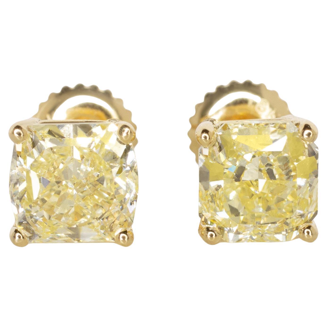 GIA Certified 6 Carat Light Yellow Diamond Studs Set in 18k Yellow Gold For Sale