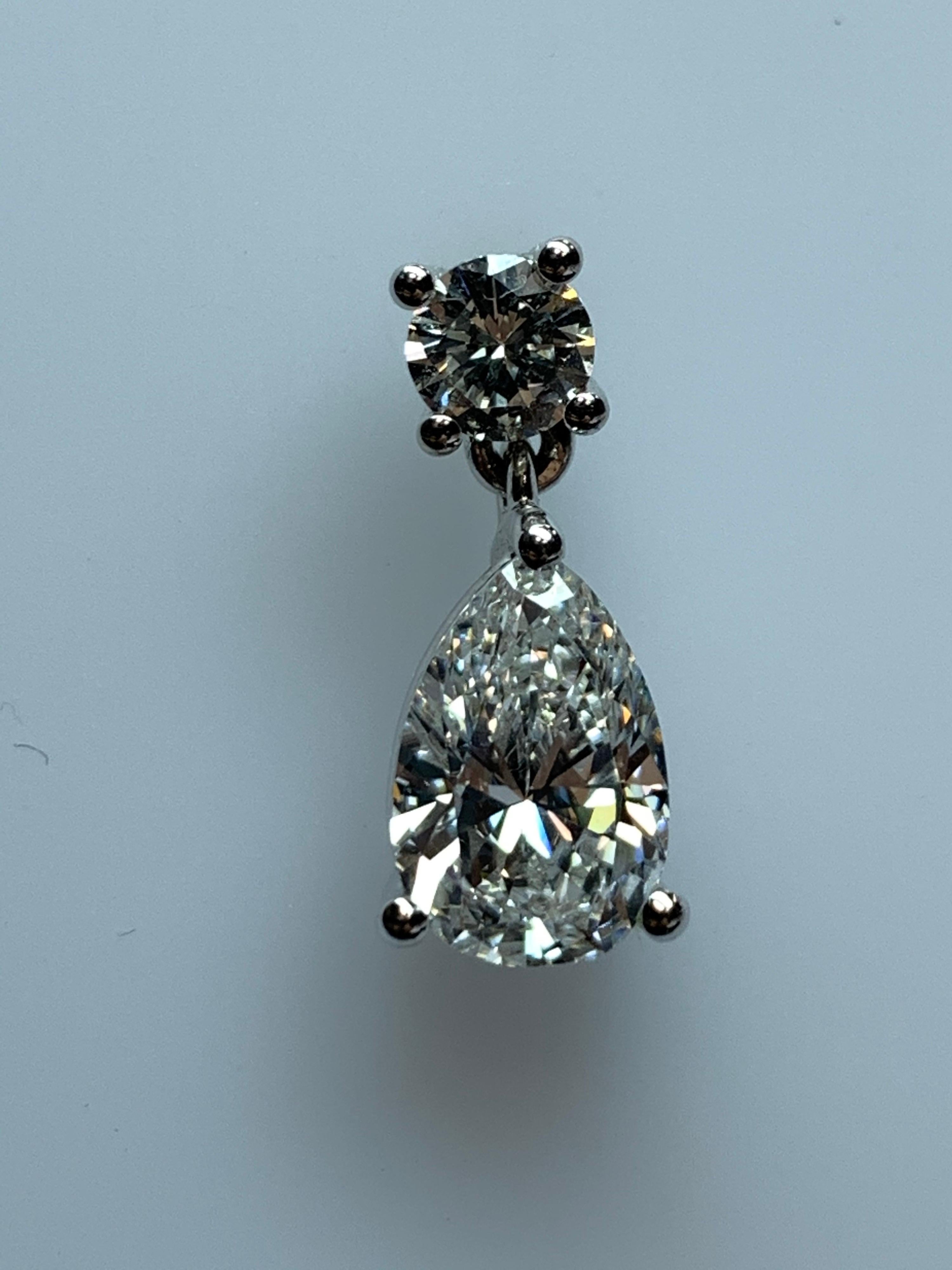 GIA Certified 4.65 Carat Matching Pear Shape E-F VS2 Natural Diamond Earrings For Sale 1