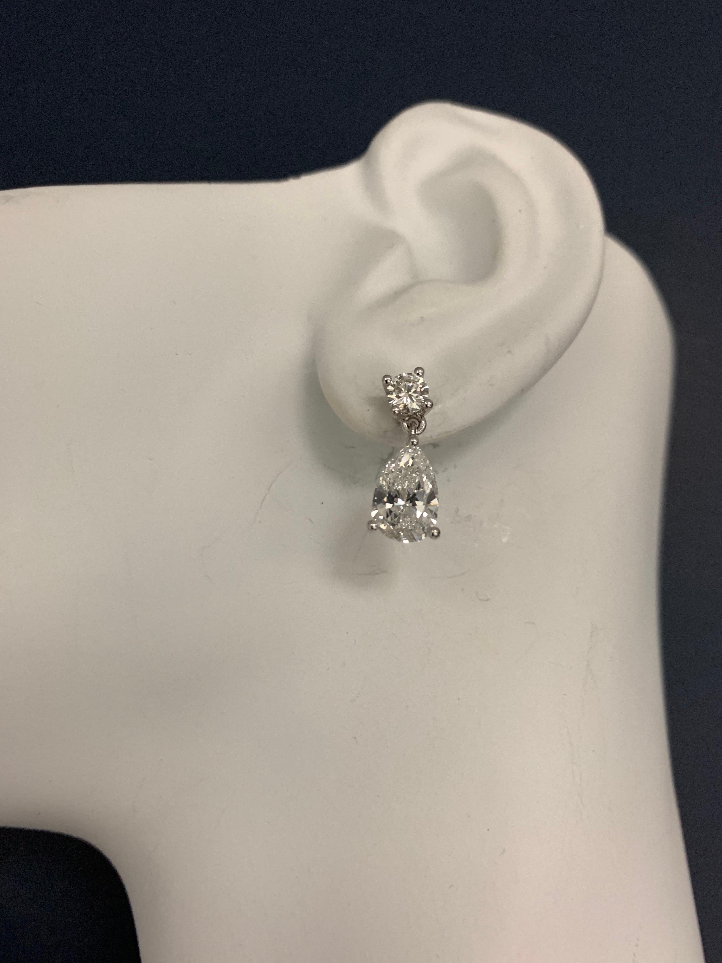 GIA Certified 4.65 Carat Matching Pear Shape E-F VS2 Natural Diamond Earrings For Sale 3