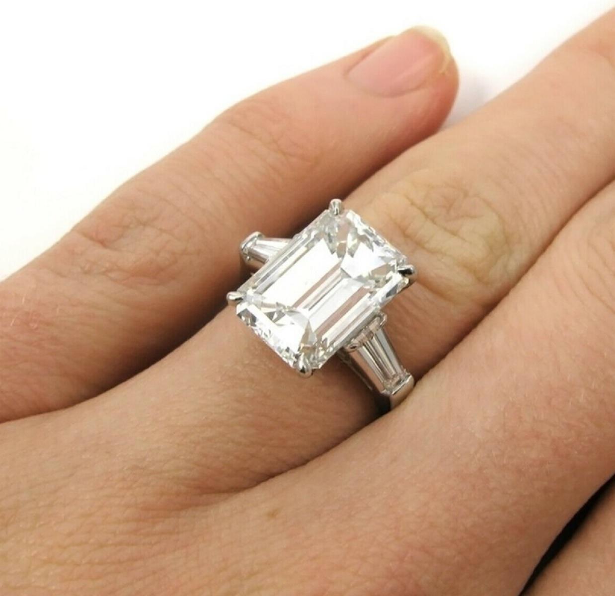 This elegant, high quality, and quite substantial 4.30 carat emerald cut diamond ring has beautiful white color, and a bright, lively, sophisticated cut! 

The diamond is certified by GIA, the world’s premiere gemological authority. 

The diamond is