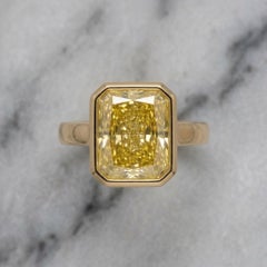 GIA Certified 4.7 Carat Fancy Yellow Diamond Solitaire Ring