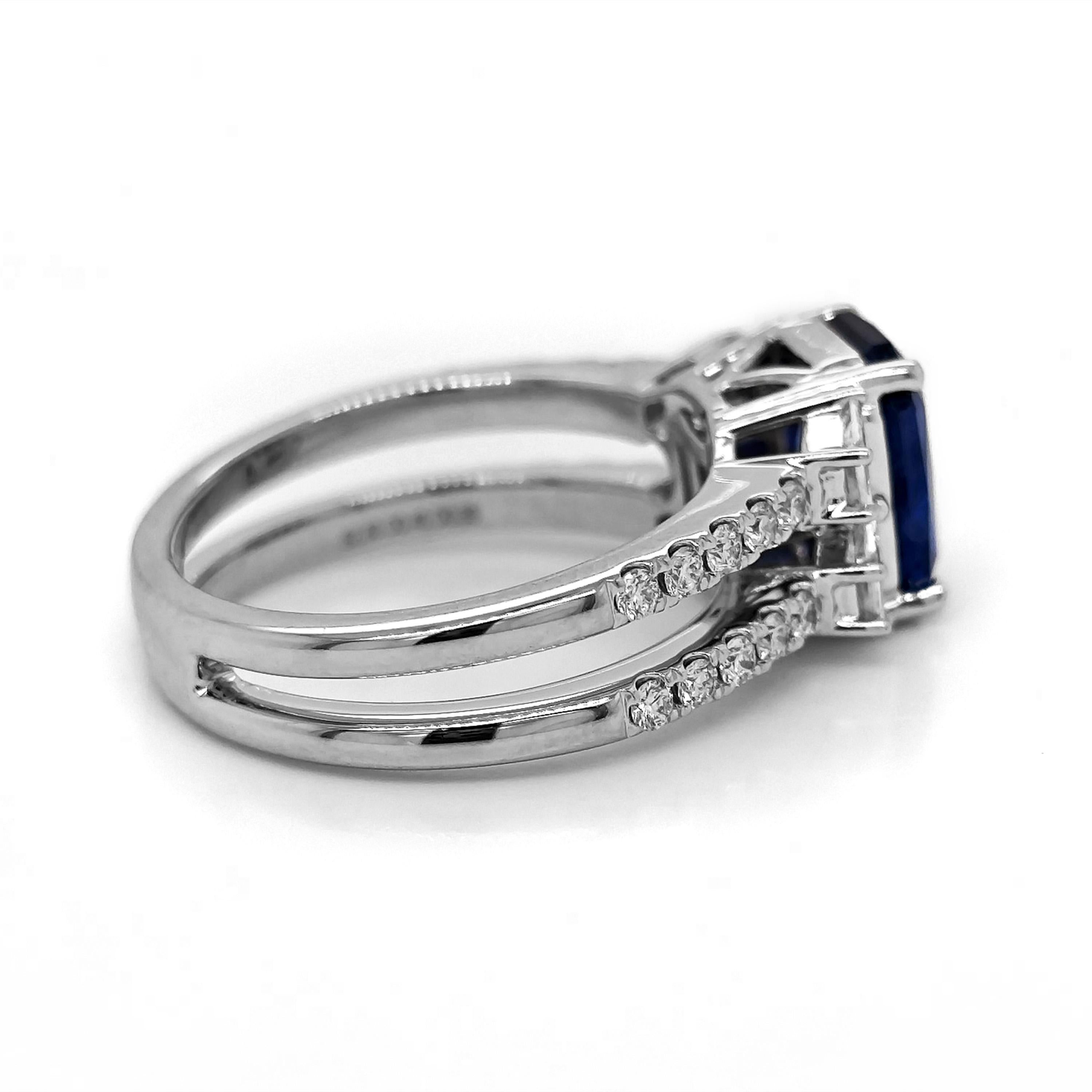 1 Sapphire Gemstone: 3.98 Carats
20 White Round Diamonds: 0.33 Carats
4 Fancy Diamonds: 0.4 Carats
Metal: 18K White Gold, 6.50 Grams

GIA Certificate # 2231466295 

