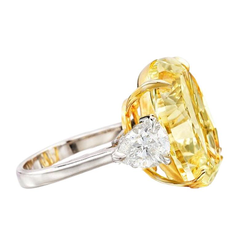 Round Cut GIA Certified 4.72 Carat Fancy Light Yellow Diamond Ring For Sale