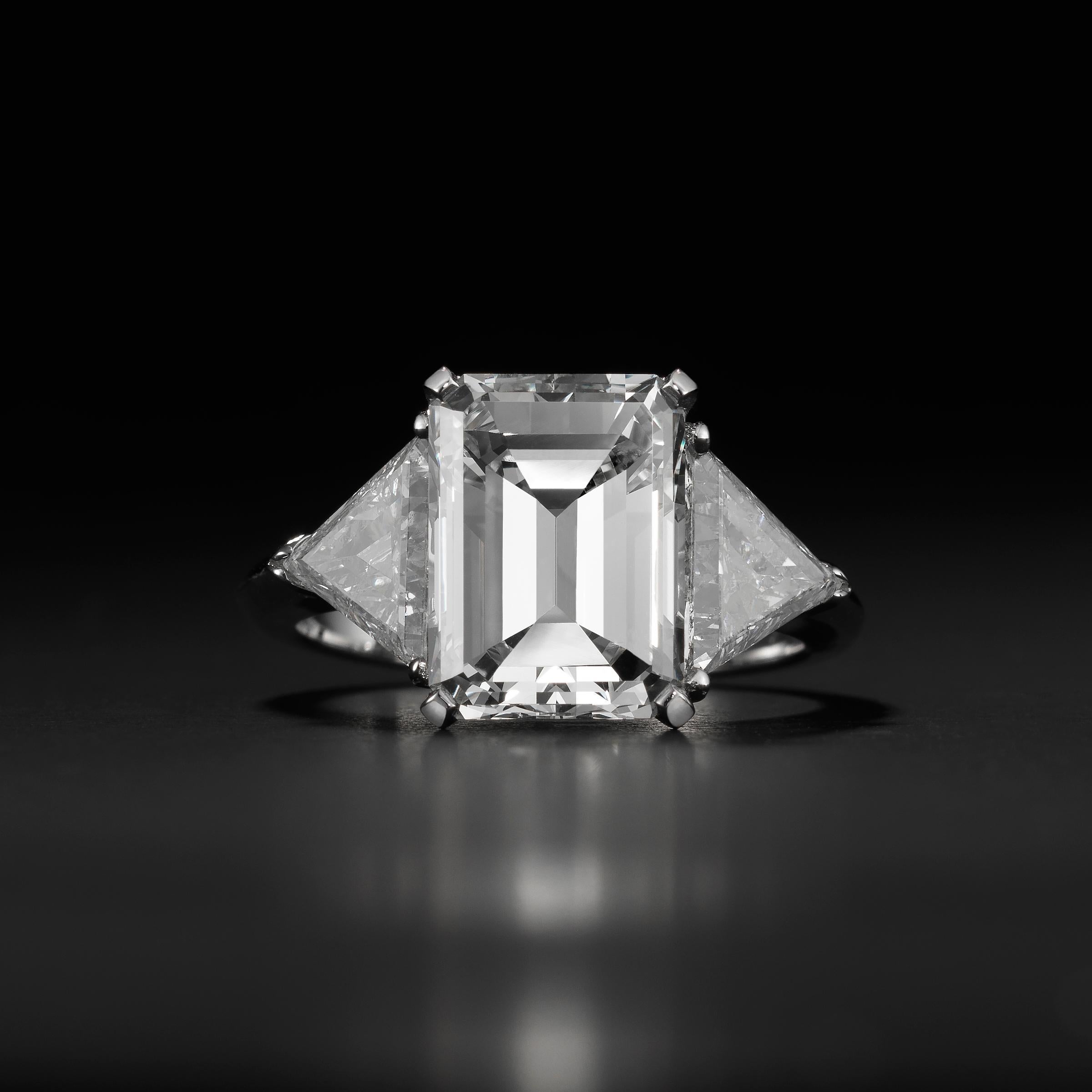 GIA Certified 4.75 carat J VS1 Emerald-Cut Diamond Three-Stone Engagement Ring in Platinum
Classically elegant diamond engagement ring featuring at its center a GIA Certified 4.75 carat emerald-cut diamond of J color and VS1 clarity. Estimated