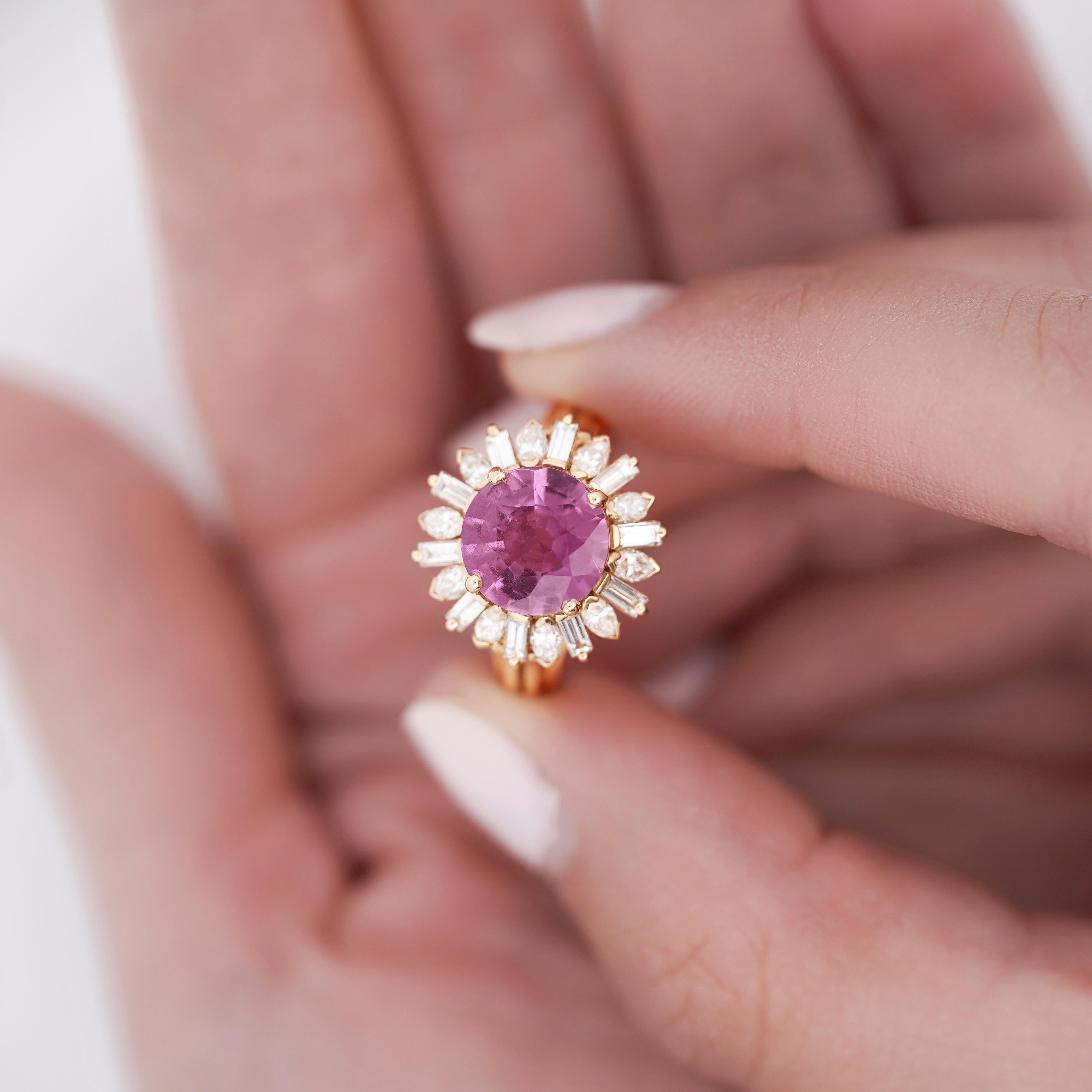 GIA Certified 3.8 Carat Oval Cut Pink Sapphire With 1 Carat TW in Baguette & Marquise Diamond Halo Statement Starburst Ring.

Details:
Item Type: Statement Ring
Metal: 18k Yellow Gold
Ring Size: 7.5 (adjustable)
Ring Face Diameter: 16mm
 
Center