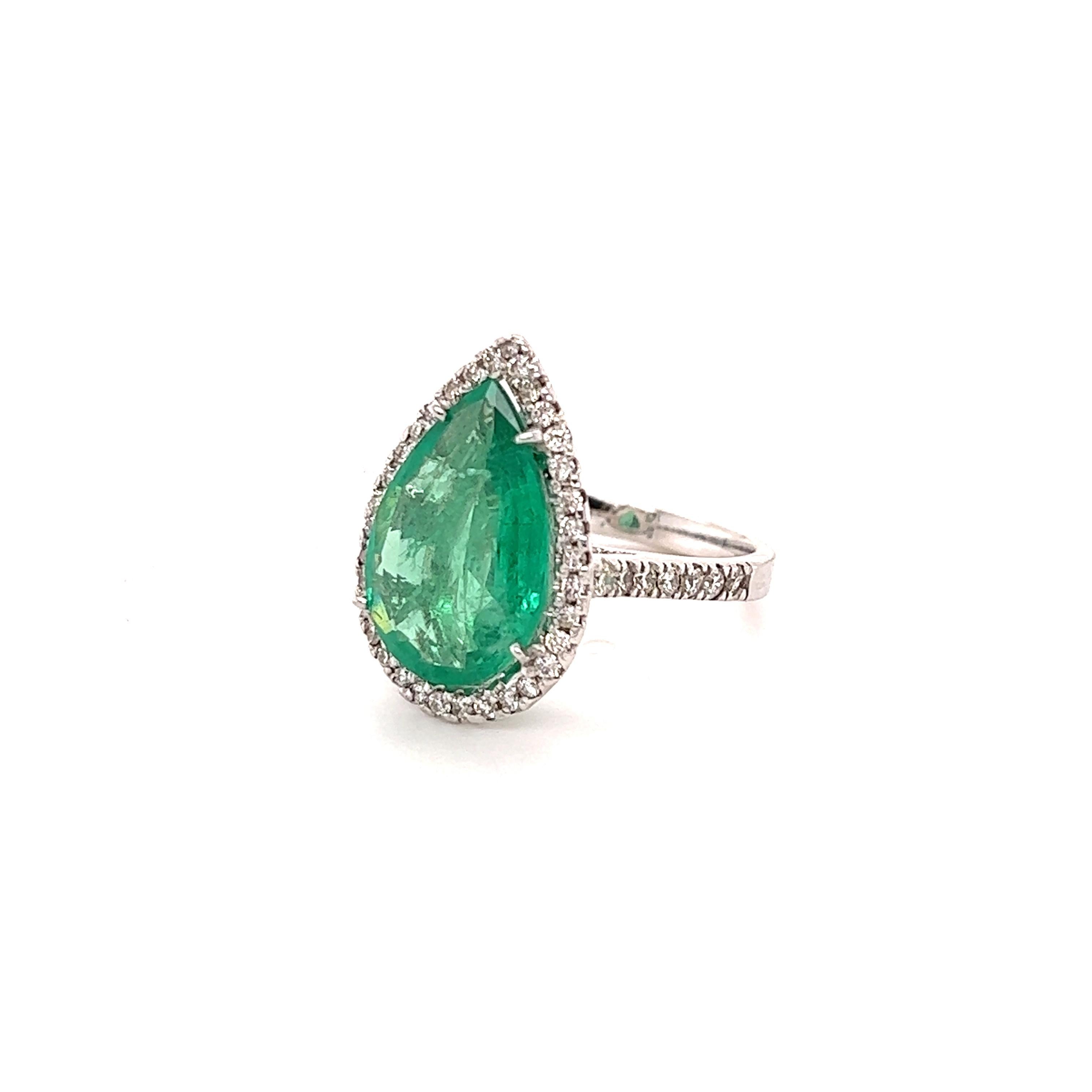 This ring has a Pear Cut Emerald that weighs 4.19 carats. It has 49 Round Cut Diamonds that weigh 0.64 carats. The total carat weight of this ring is 4.83 carats. 

The Pear Cut Emerald measures at 17 mm x 12 mm. The ring is also GIA certified. The