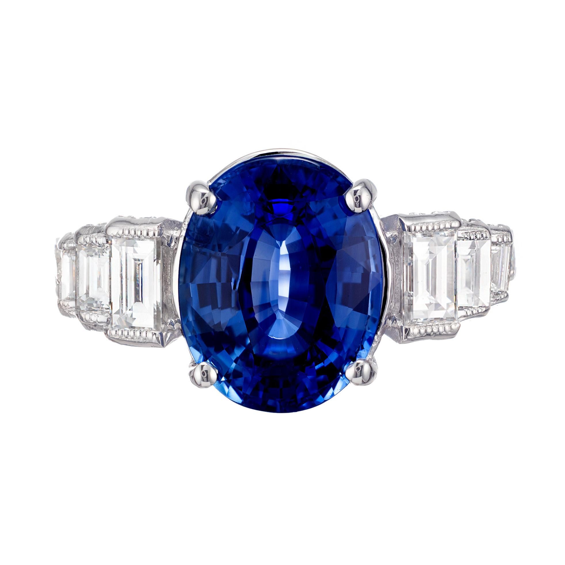 4.83ct oval sapphire and diamond engagement ring. Gia certified natural color, simple heat only, no residue. Center oval sapphire set in 18k white gold setting, accented with step cut and round diamonds. Designed and crafted in the Peter Suchy