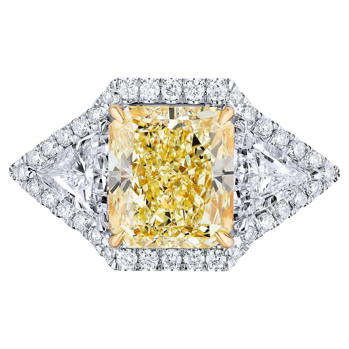 GIA Certified 5.02 Carat Radiant Yellow Diamond Ring For Sale