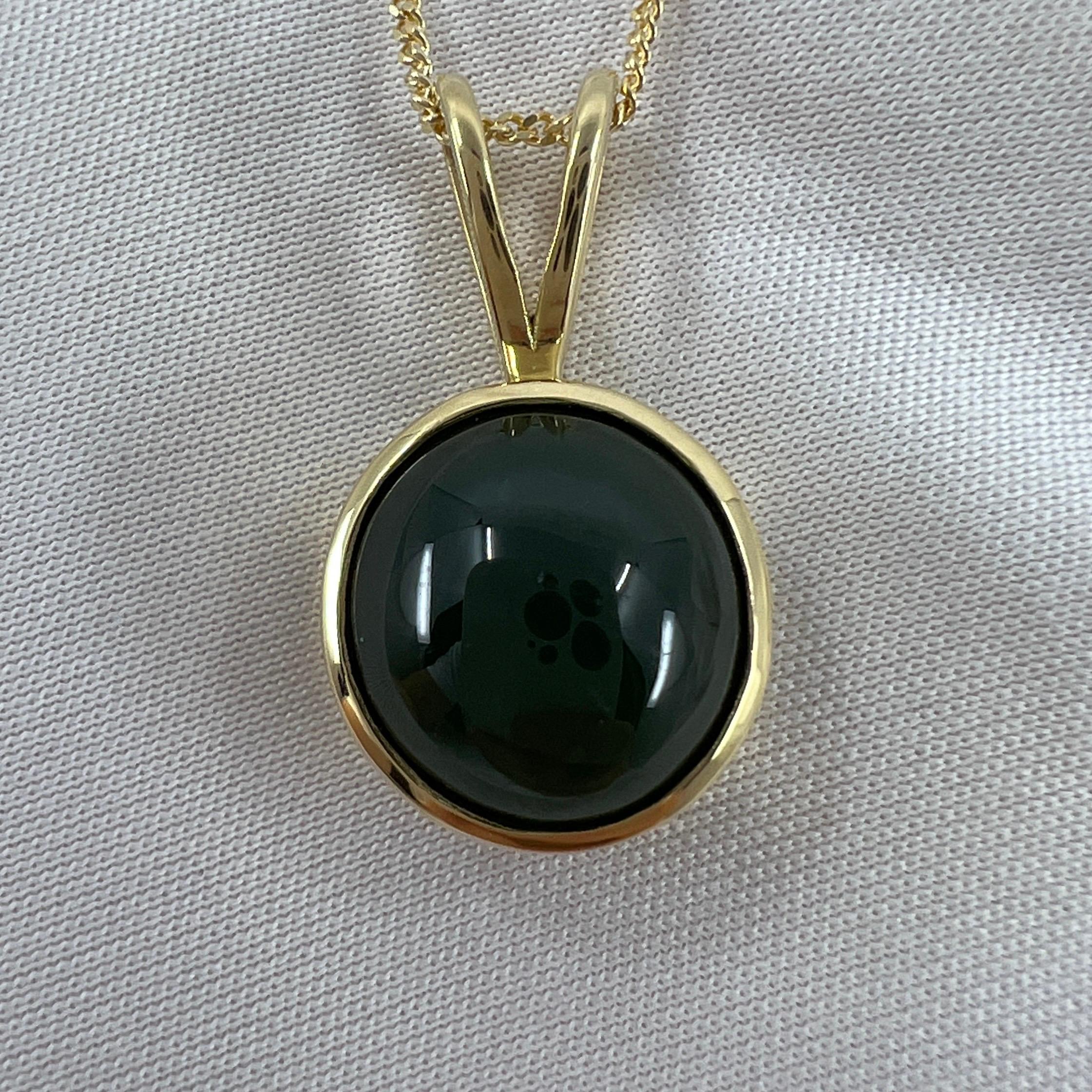 GIA Certified 4.94ct Untreated Deep Green Jadeite Jade A-Grade Pendant Necklace.

Beautiful untreated jadeite stone with a deep green colour and excellent round cabochon cut. 

It's very difficult to photograph cabochons due to how the dome reflects