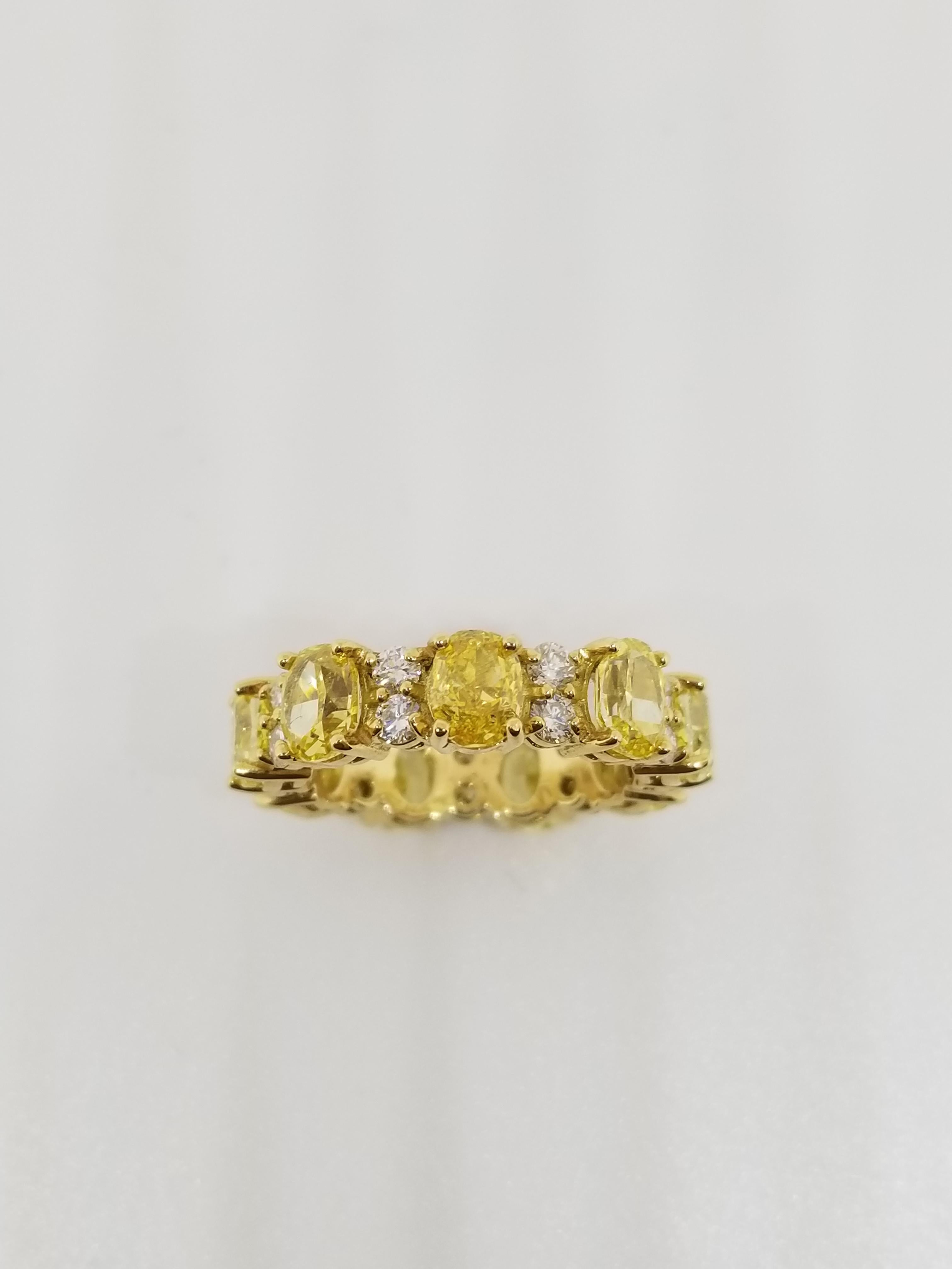 Women's or Men's GIA Certified 4.98 Carat Natural Fancy Vivid Yellow Oval Diamond Eternity Band