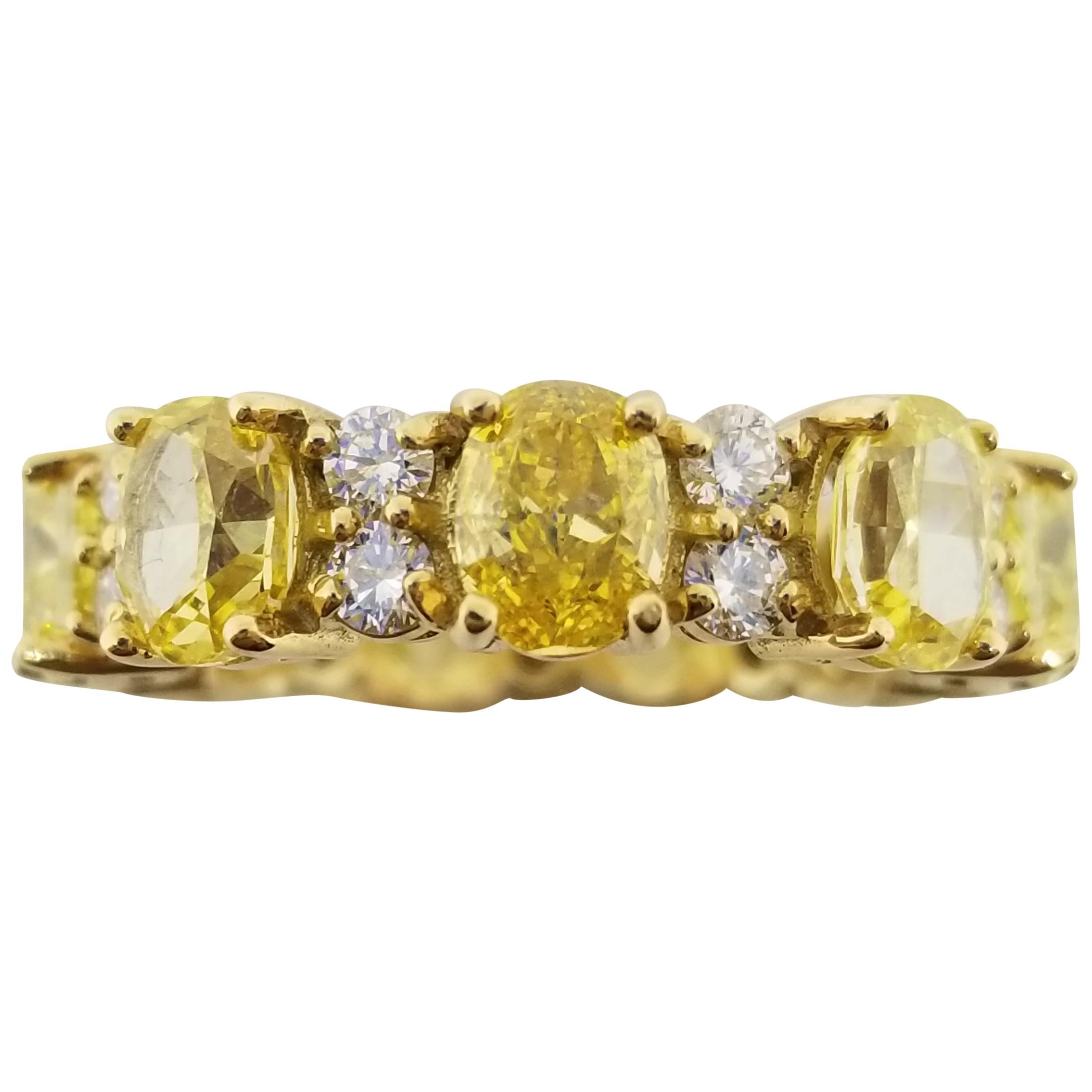 GIA Certified 4.98 Carat Natural Fancy Vivid Yellow Oval Diamond Eternity Band