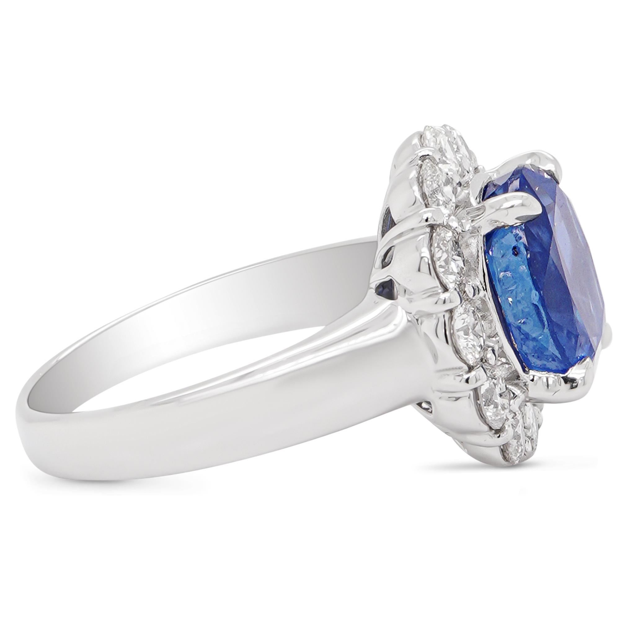 A stunning 5 carat GIA Certified Burma No heat blue sapphire is set with 1.05 carats of white round brilliant diamond.
Burmese sapphires are among the most coveted colored gemstones in the world. The historical importance of this source and the fine