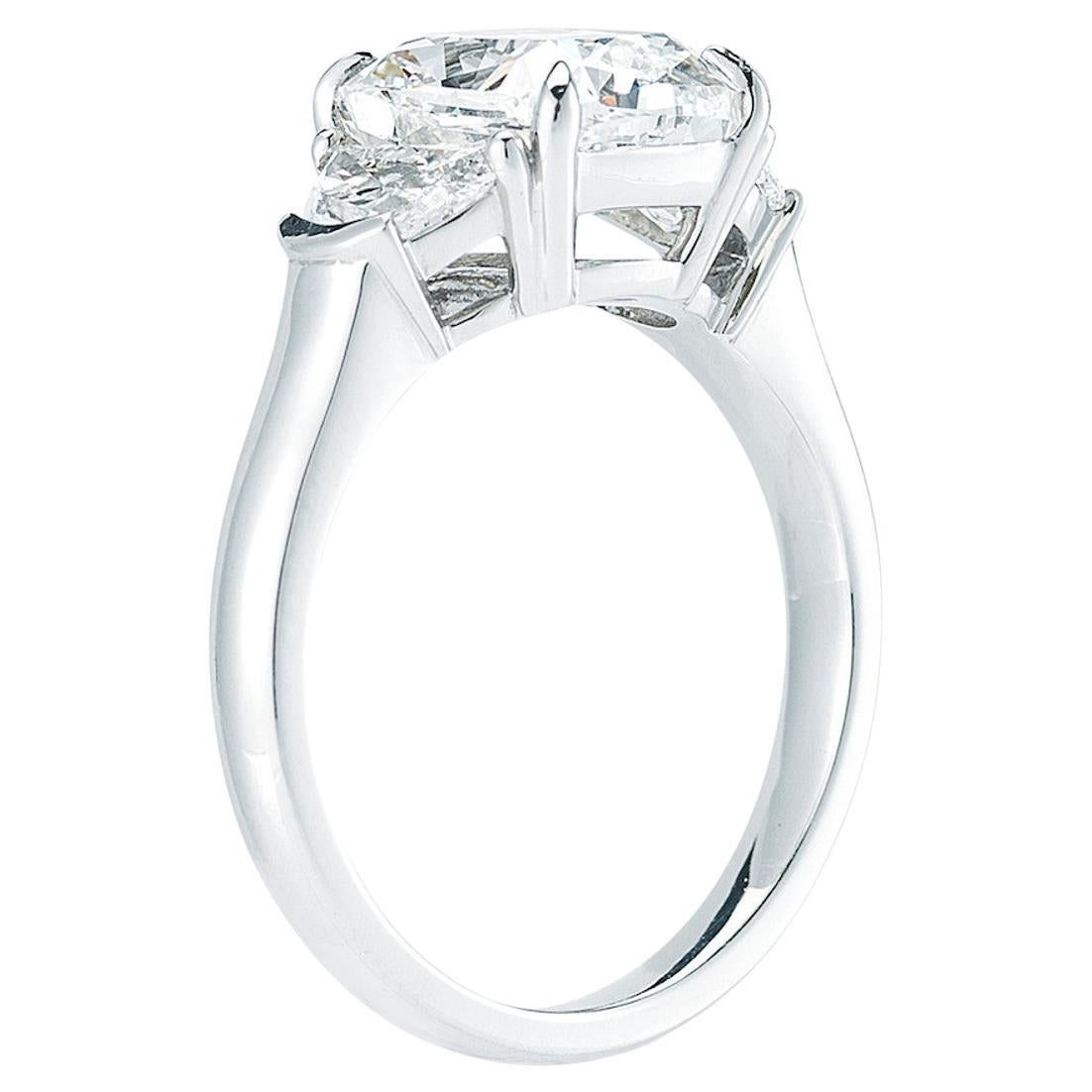 From the prestigious Antinori Di Sanpietro collection comes an engagement ring that is a true masterpiece. At the heart of this creation is a 5 carat cushion modified brilliant diamond. The diamond, graded F for color, radiates a dazzling white