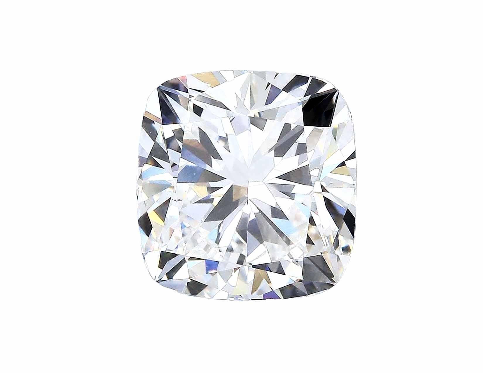 This elegant engagement ring features a GIA-certified 5.25 carat cushion cut diamond as its stunning centerpiece, exuding timeless sophistication. 

With a G color grade, the diamond offers a near-colorless brilliance that enhances it's radiant