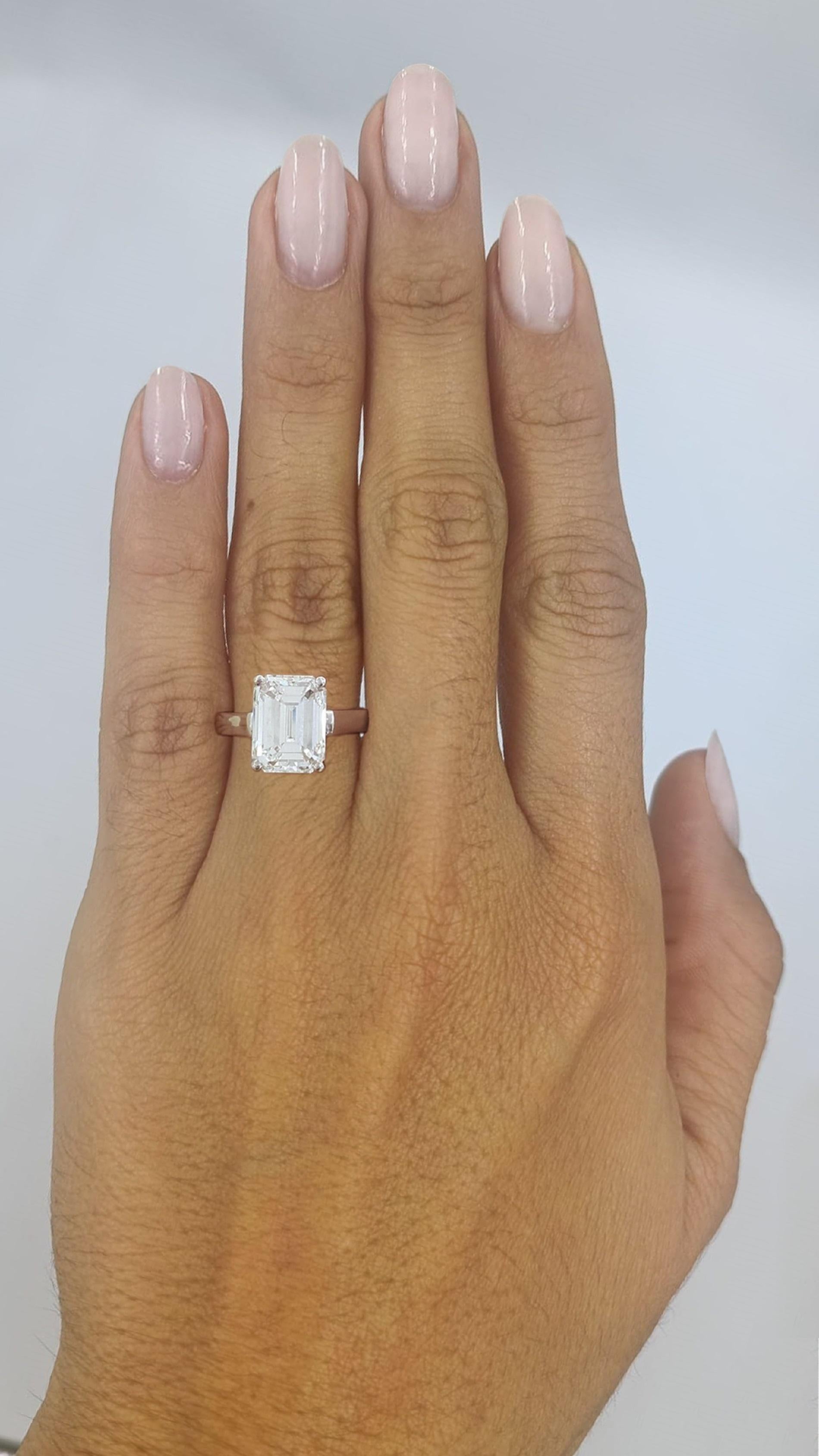 Women's or Men's GIA Certified 5.08 Carat Emerald Cut Diamond E Color IF Clarity Platinum Ring For Sale