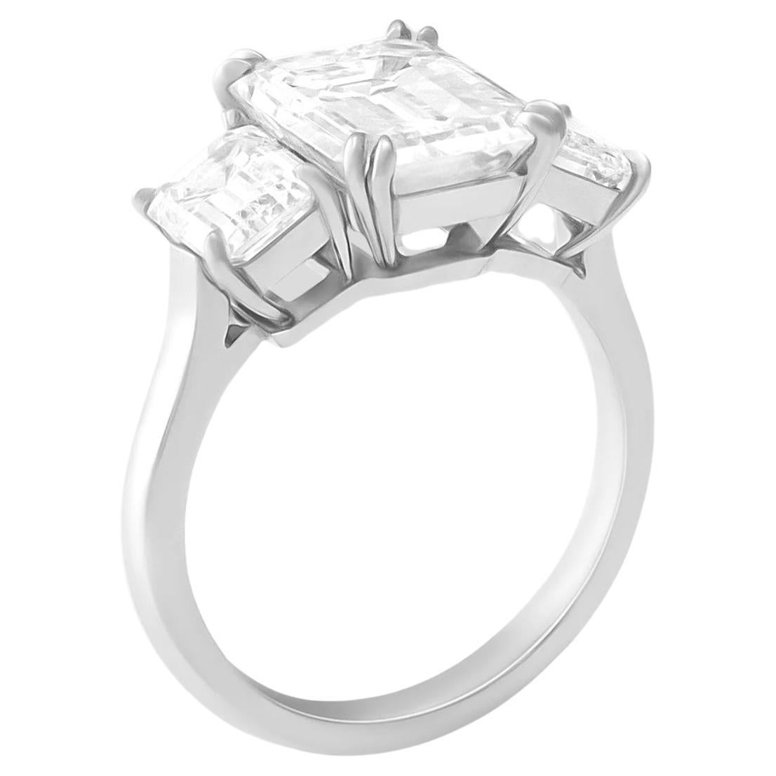 Contemporary GIA Certified 5 Carat Emerald Cut Diamond F Color VS2 Clarity 3 Stone Ring For Sale