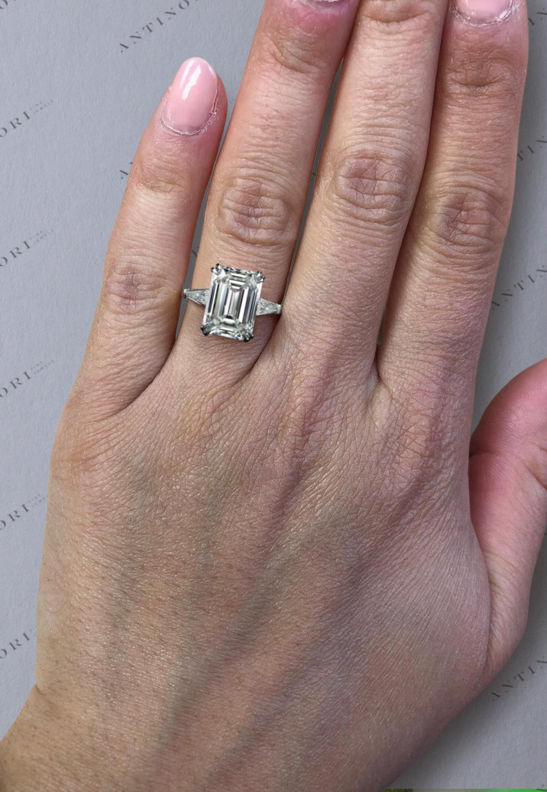 GIA Certified 5 Carat Emerald Cut Diamond Platinum Ring with Tapered Baguette In New Condition For Sale In Chicago, IL