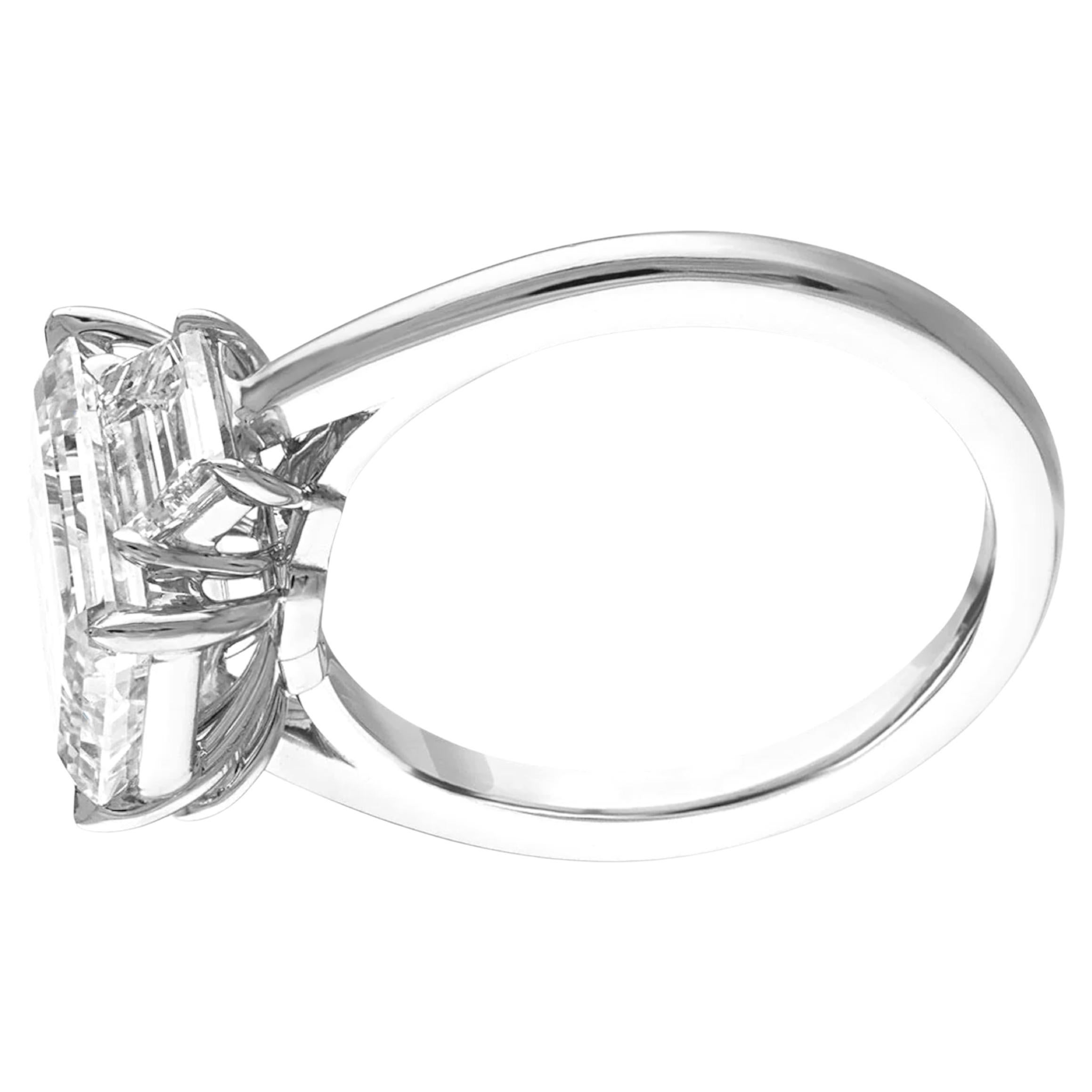 Contemporary GIA Certified 5 Carat Emerald Cut DiamondD COLOR VVS2 Clarity Platinum Ring For Sale