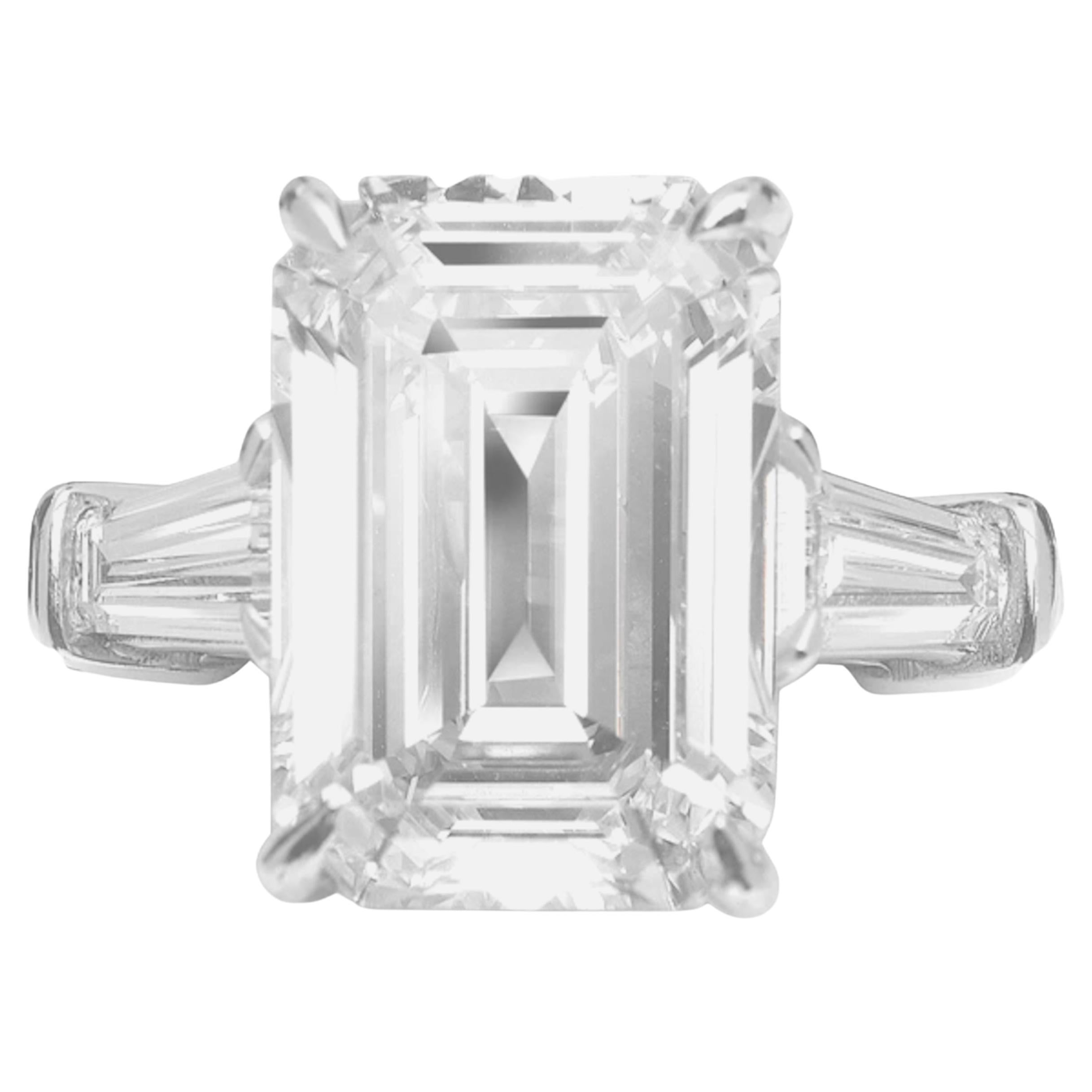 Contemporary GIA Certified 5.11 Carat Emerald Cut Diamond Ring F Color VVS2 Clarity For Sale
