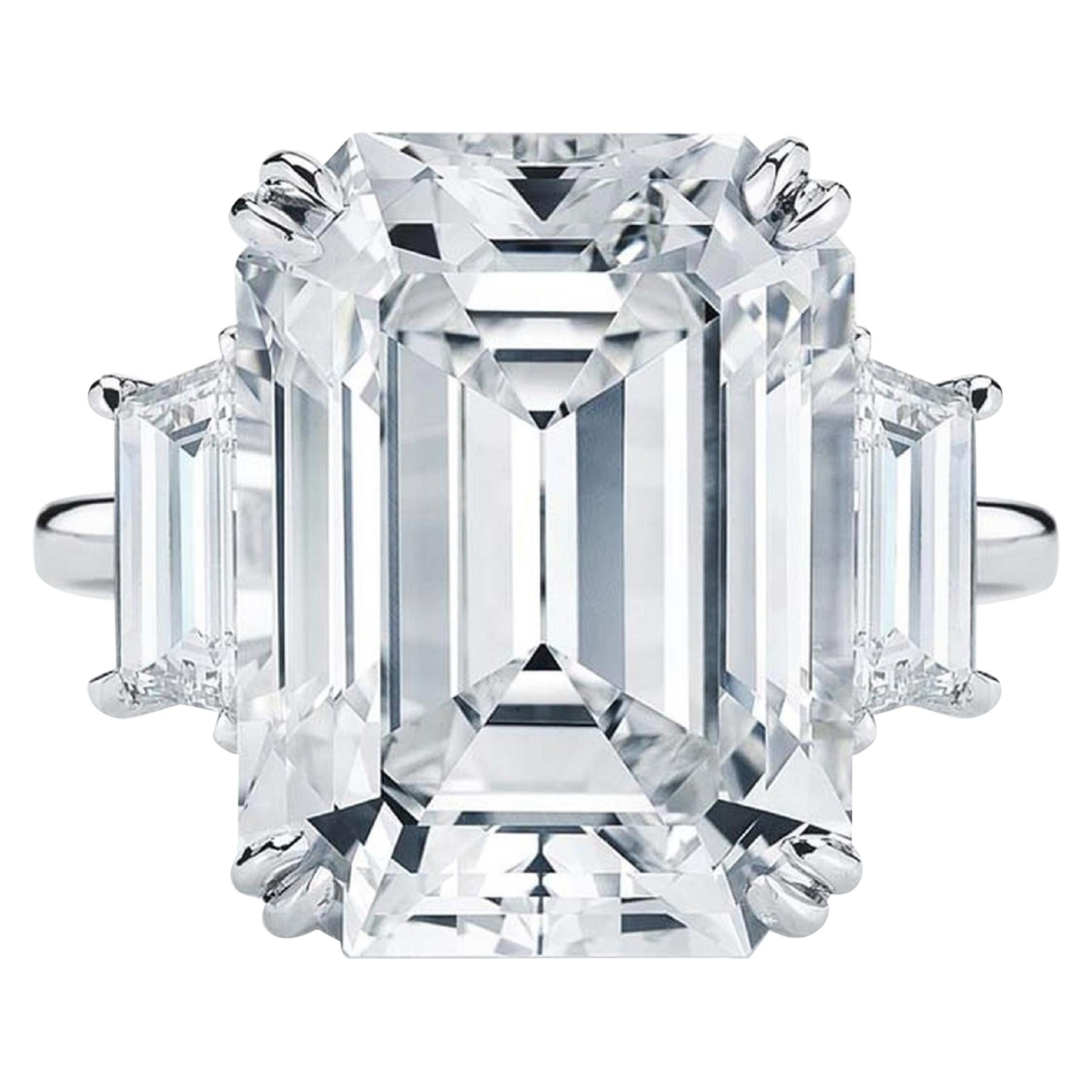 GIA Certified 5.09 Carat Emerald Cut Trapezoid Three Stone Platinum Ring