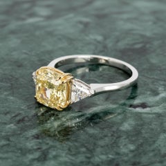 GIA Certified 5.16 Carat Cushion Cut Fancy Yellow Diamond Ring in 18K Gold