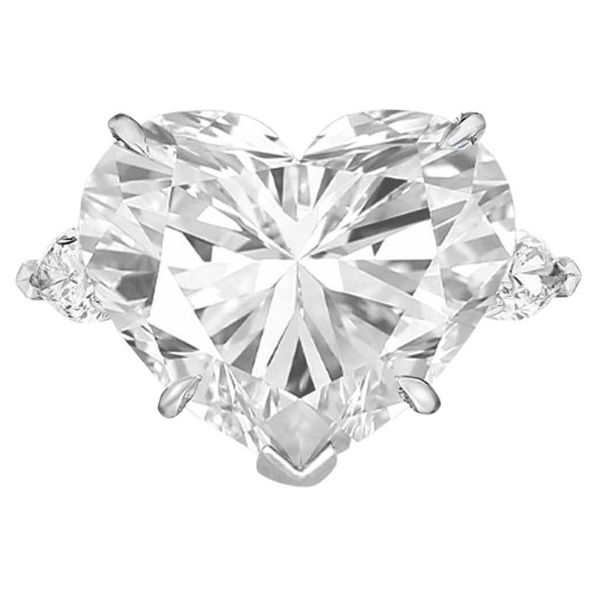 Anillo de platino con diamante talla pera y corazón de 5.06 quilates certificado por GIA