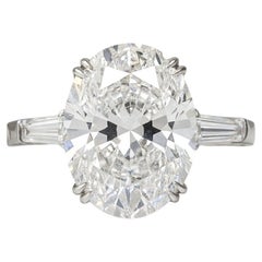 GIA Certified 5 Carat Oval Cut Diamond Ring in Platinum with tapered baguette
