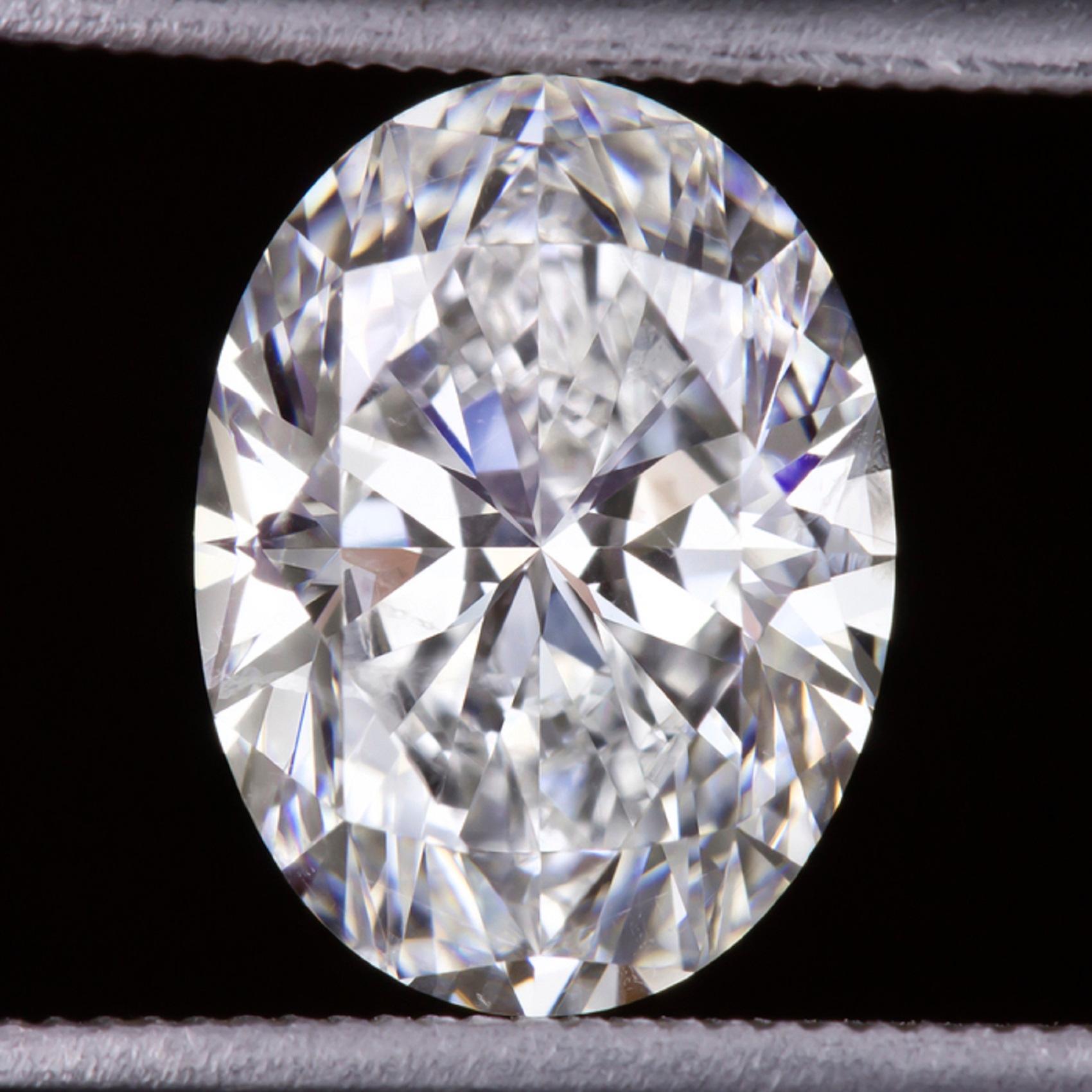 An amazing  5 catat GIA certified oval cut diamond has excellent H color, a completely eye clean appearance, and gorgeous, lively brilliance! Oval cuts are one of the most fashionable and sought after diamond cuts, and it is very flattering and eye