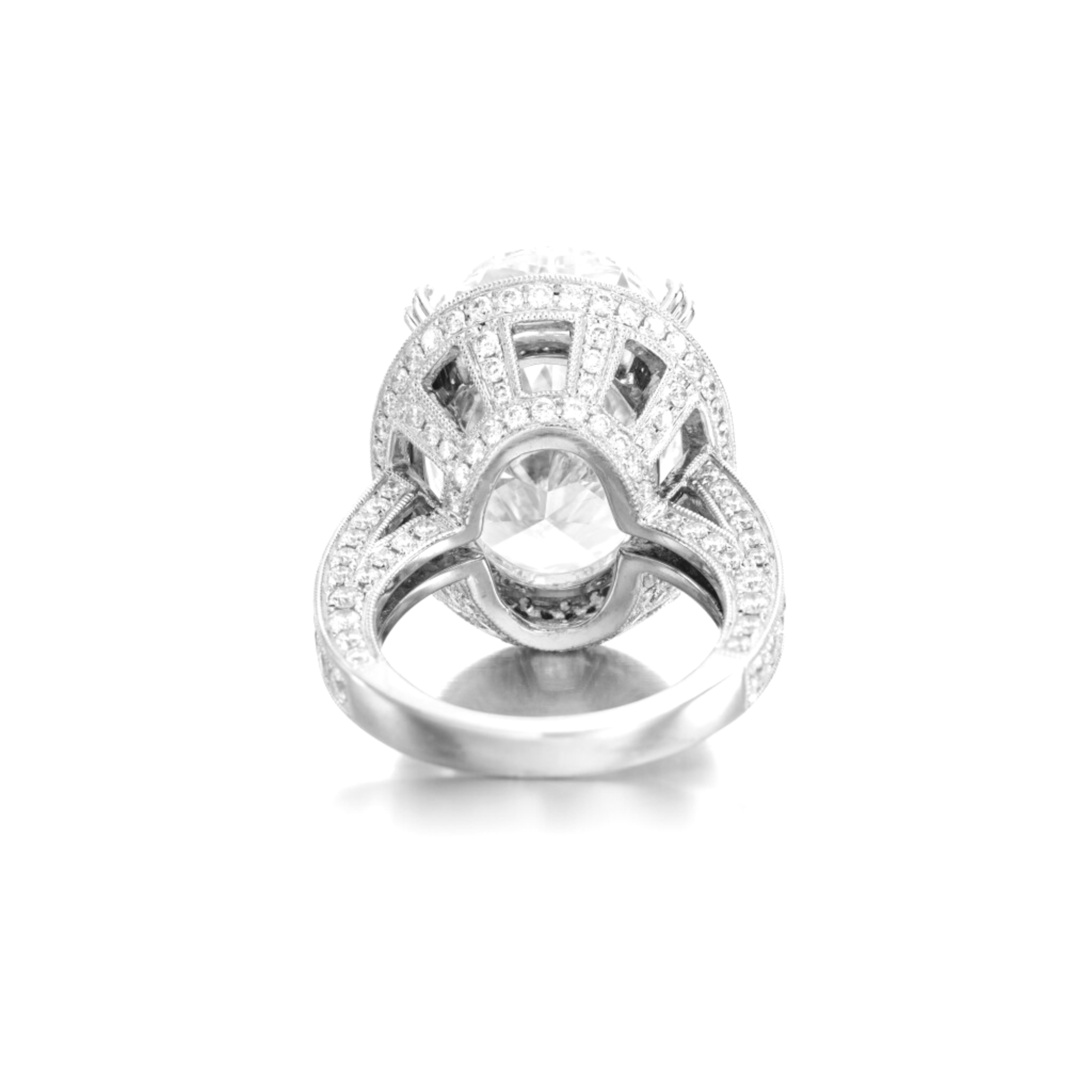 This exquisite solitaire ring features a GIA-certified 5-carat oval Cut Diamond, set in a timeless platinum design. The diamond boasts exceptional quality, with the following characteristics:

Color Grade: D
Clarity Grade: VVS1


This ring is a true