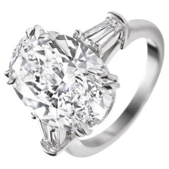 GIA Certified 5.55 Carat Oval Cut Diamond Engagement Ring with tapered baguette