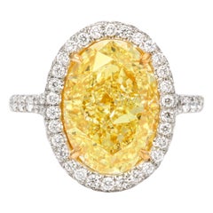 Anello di diamanti gialli ovali fantasia certificati GIA da 5 carati